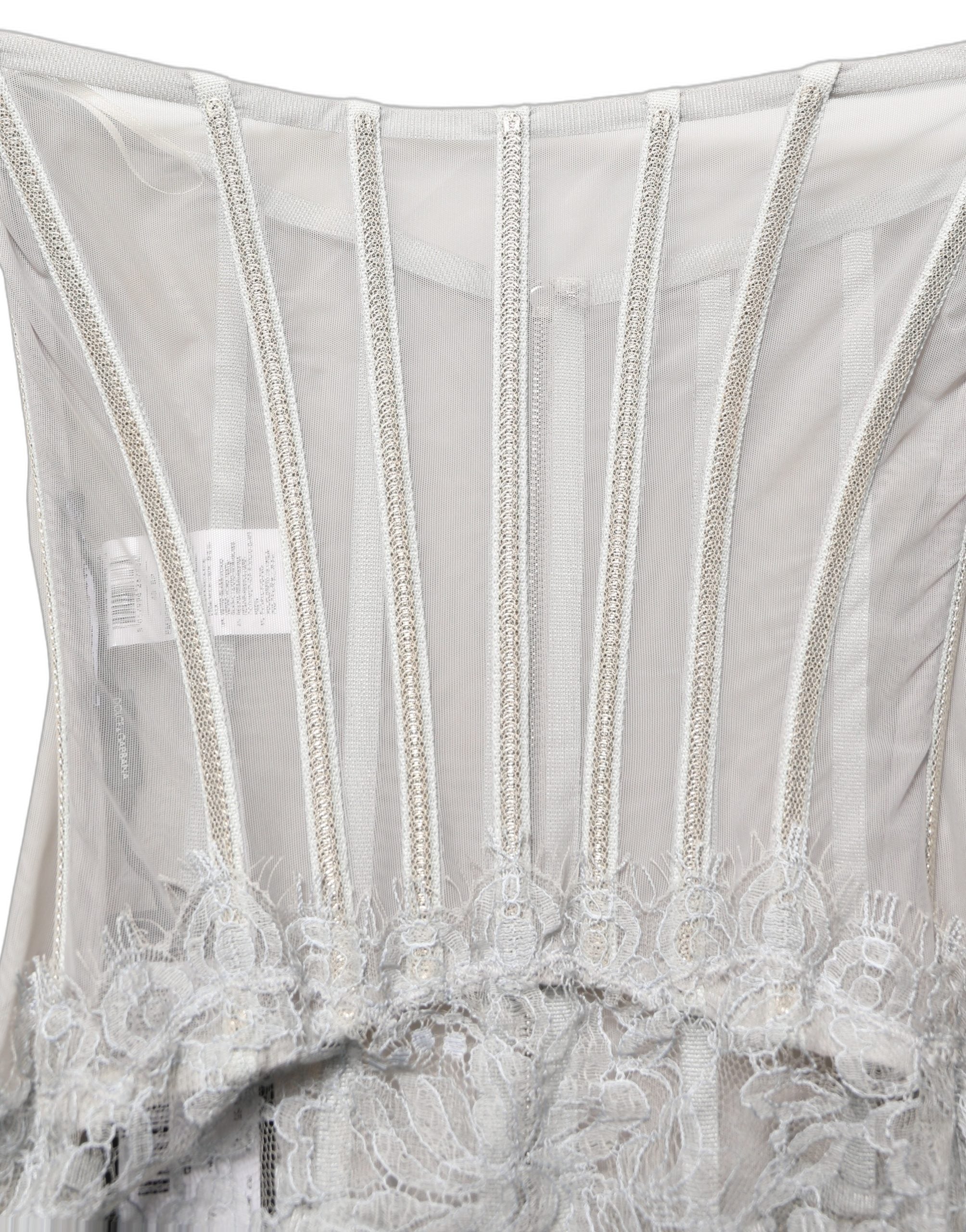 Discover the Dolce & Gabbana Gray Lace Corset Style Bodice Maxi Dress, a masterpiece of Italian craftsmanship that embodies sensual elegance and timeless allure.