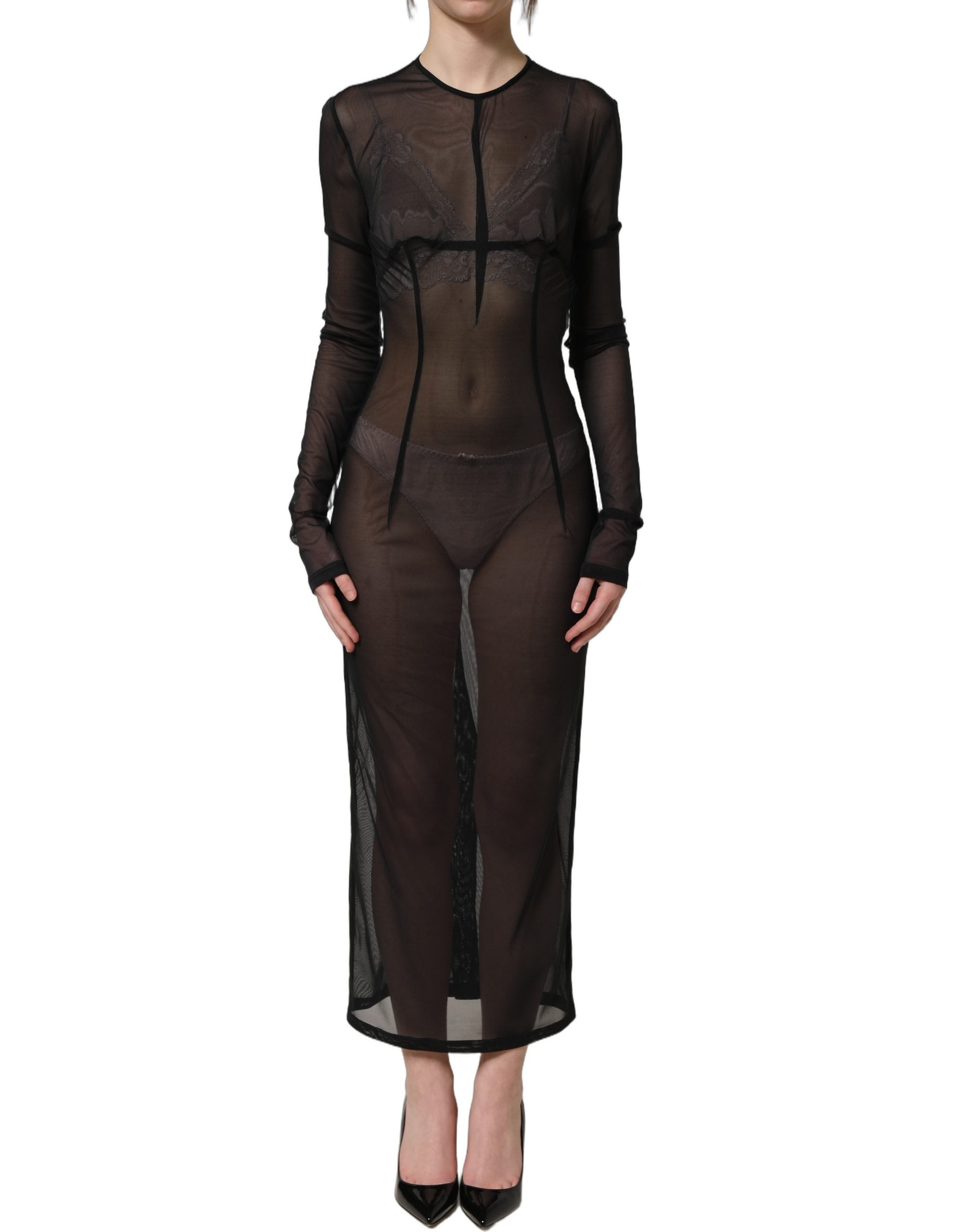 Experience the allure of the Dolce & Gabbana Black Long Sleeve Sheer Fitted Maxi Dress, a masterpiece of Italian craftsmanship that exudes timeless elegance and sophistication.