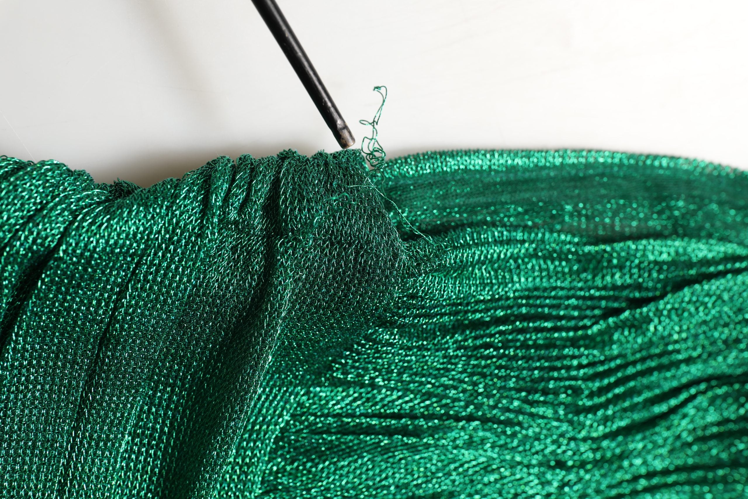 Indulge in the exquisite Dolce & Gabbana Emerald Green Plissé Evening Gown, a masterpiece of luxurious craftsmanship and timeless elegance, perfect for unforgettable moments.