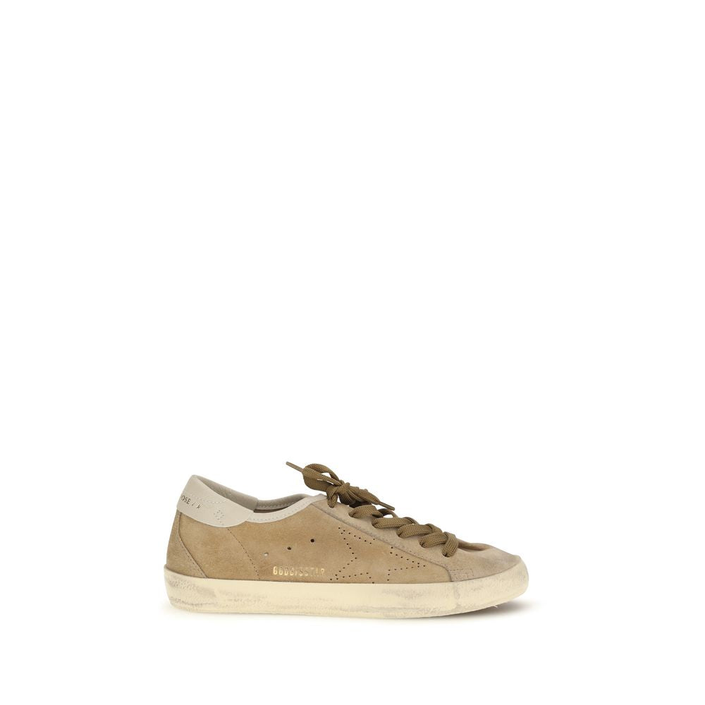 Experience the allure of Golden Goose's Beige Calf Leather Bos Taurus Low Top Sneakers, where artisanal craftsmanship meets timeless elegance for the discerning individual.