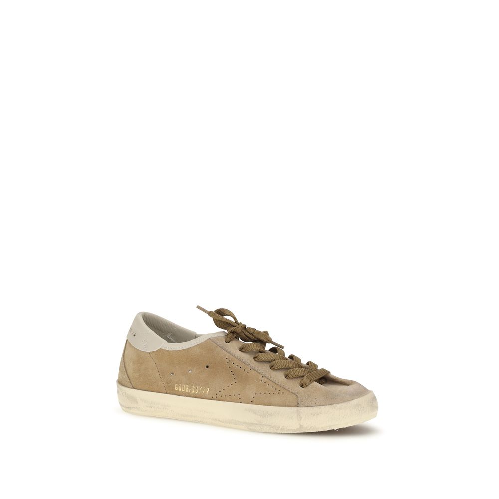 Elevate your style with Golden Goose's Beige Calf Leather Bos Taurus Low Top Sneakers, where artisanal craftsmanship meets timeless elegance for the discerning individual.