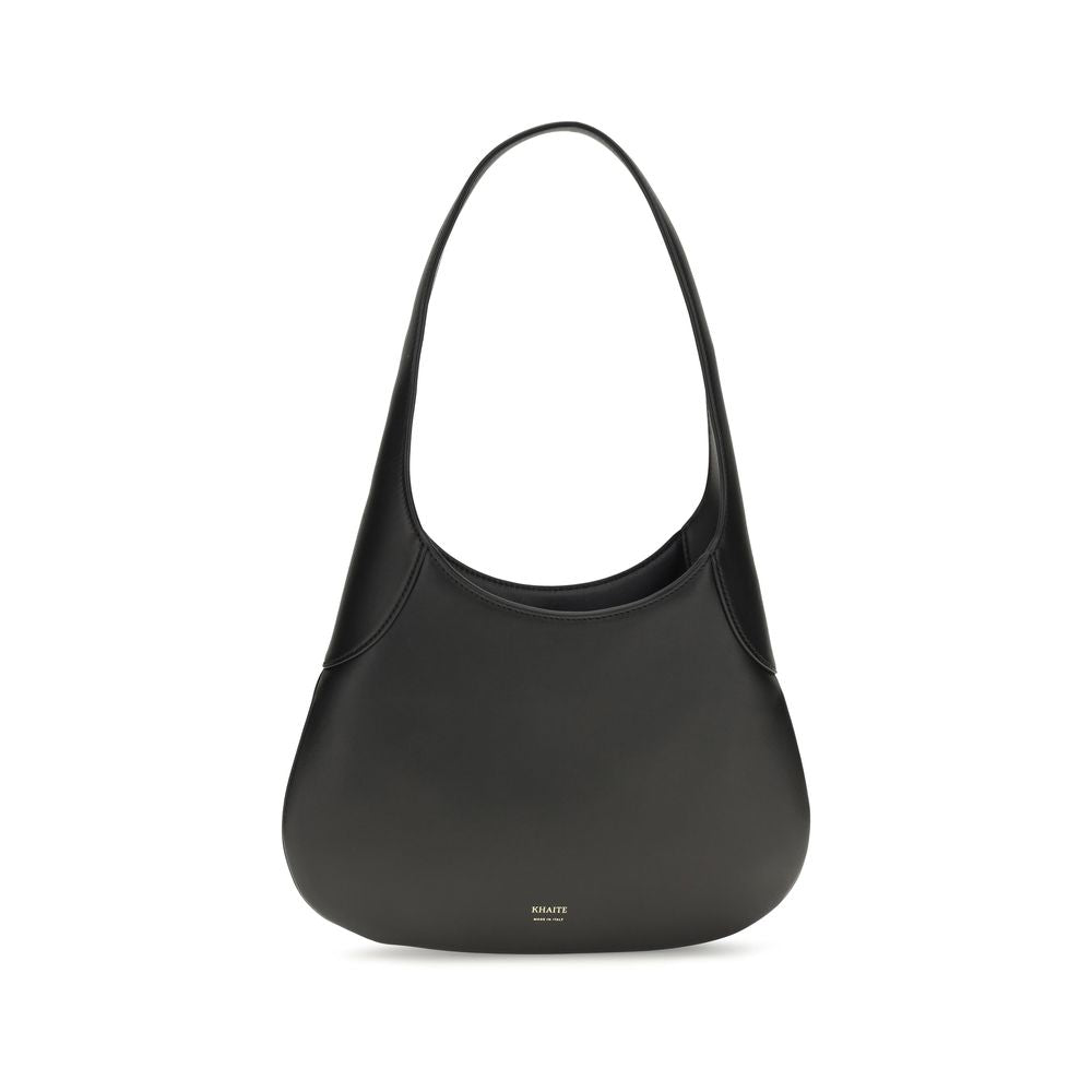 Discover the Khaite Black Calf Leather Bos Taurus Handbag, an artisanal masterpiece of elegance and sophistication, perfect for the discerning individual.
