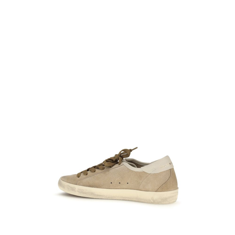 Elevate your style with Golden Goose's Beige Calf Leather Bos Taurus Low Top Sneakers, where artisanal craftsmanship meets timeless elegance for the discerning individual.