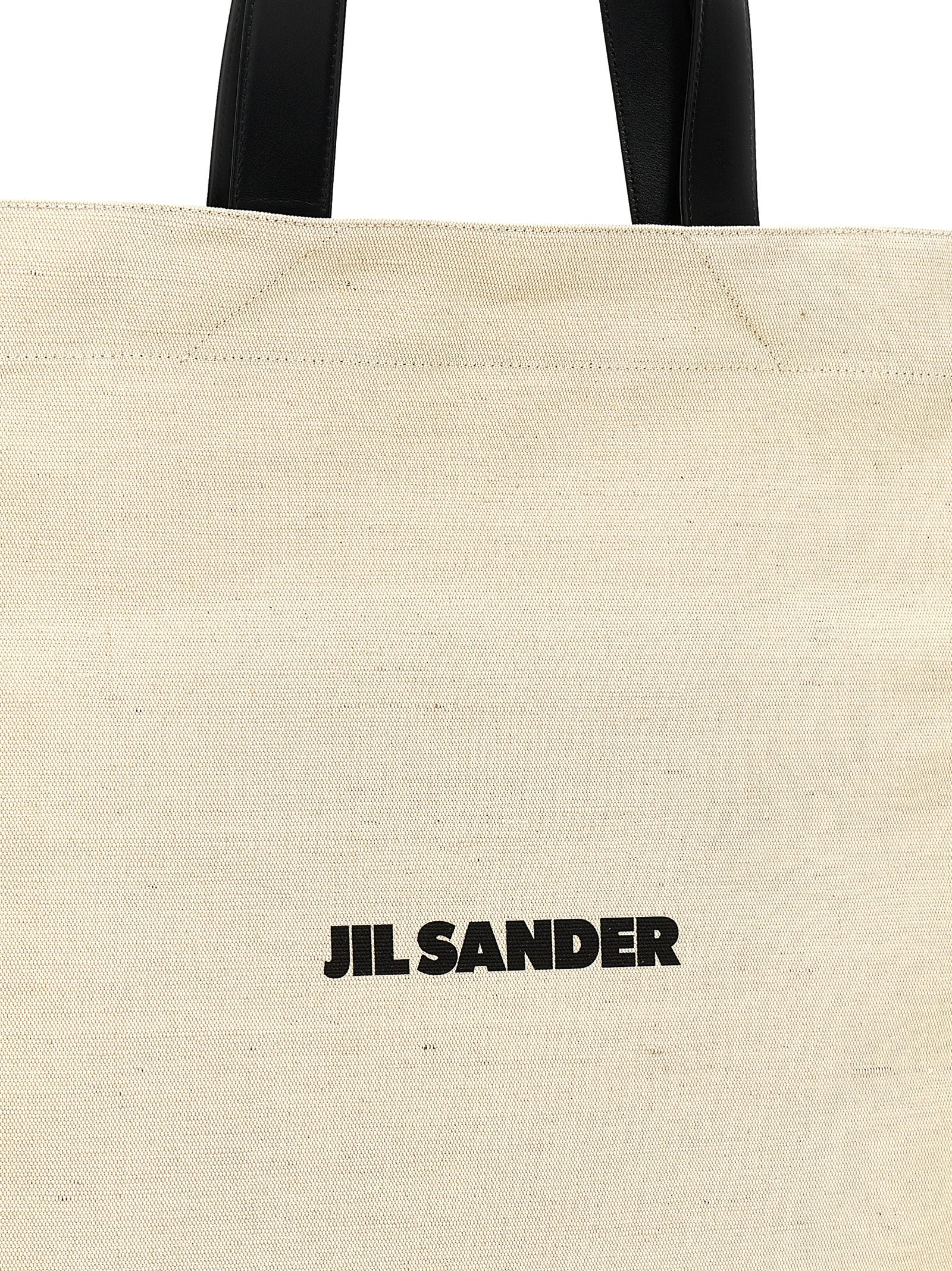 Elevate your everyday elegance with the Jil Sander Bicolor Cotton Tote Bag, a masterpiece of artisanal luxury crafted in Italy, blending sophisticated style with timeless functionality.