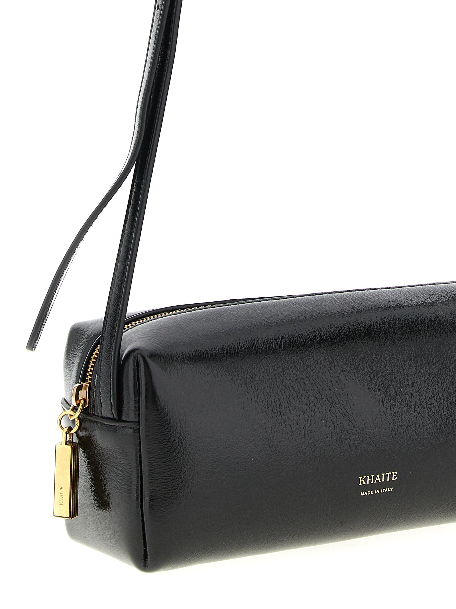 Discover the Khaite Black Calfskin Crossbody Bag, a masterpiece of Italian craftsmanship that embodies timeless elegance and modern sophistication for the discerning individual.