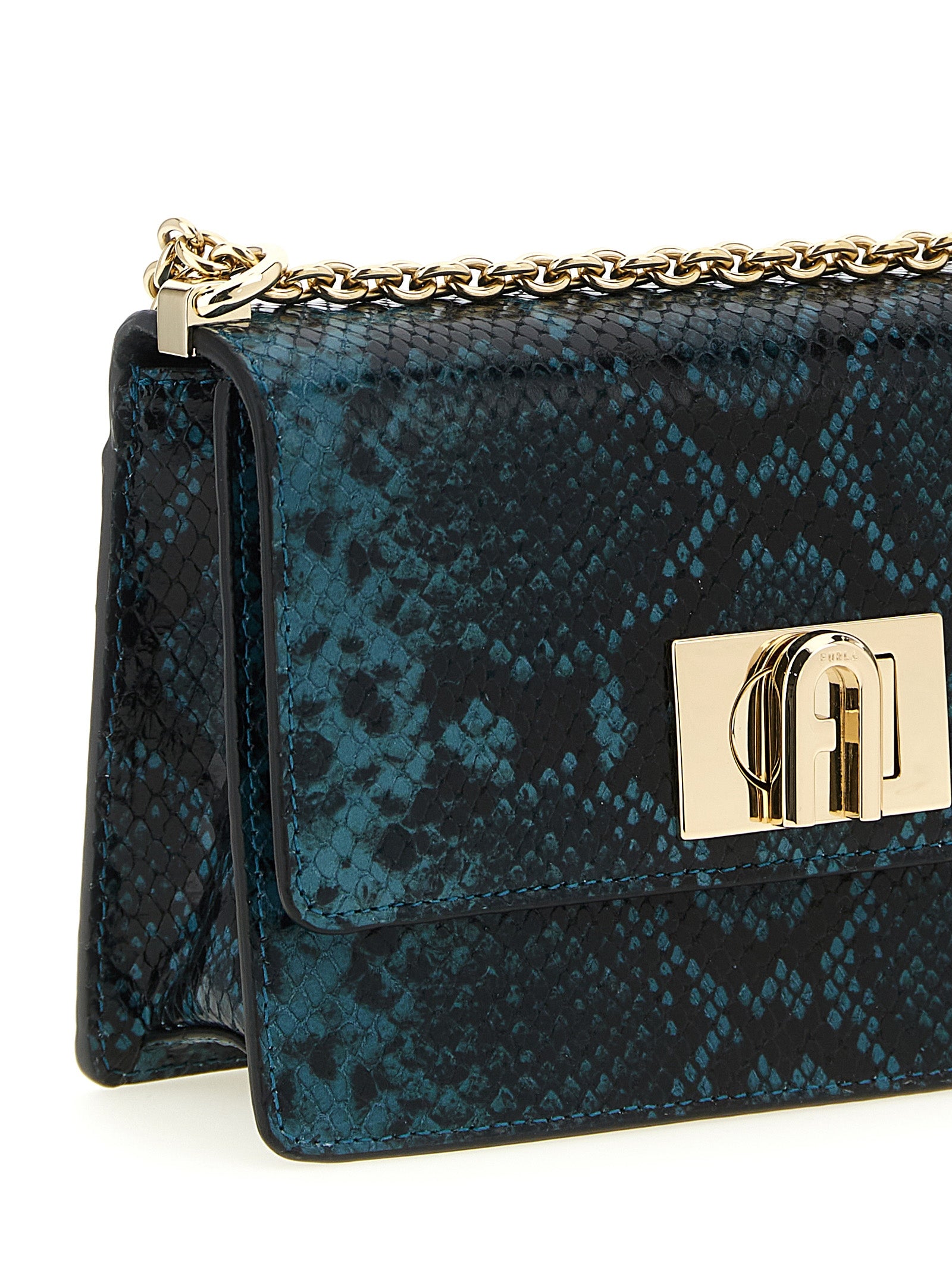 Indulge in the Furla Blue Goatskin Crossbody Bag from the 1927 collection, a blend of exquisite craftsmanship and luxurious materials, perfect for elevating any ensemble.