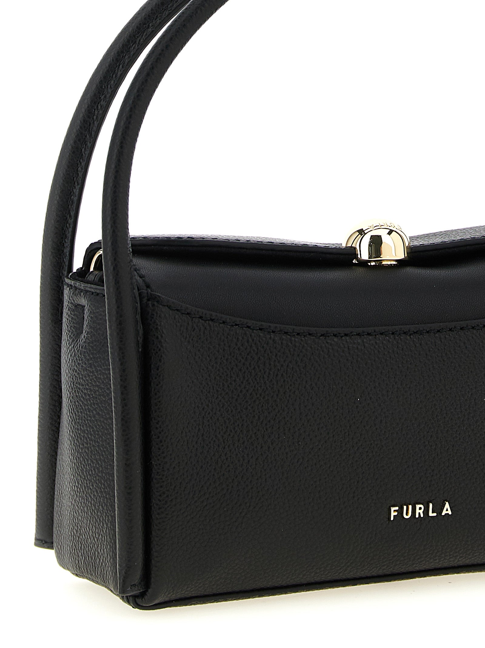 Discover the Furla Black Calfskin Handbag, a symbol of artisanal luxury crafted from exquisite calfskin leather, perfect for those who embrace sophistication and style.