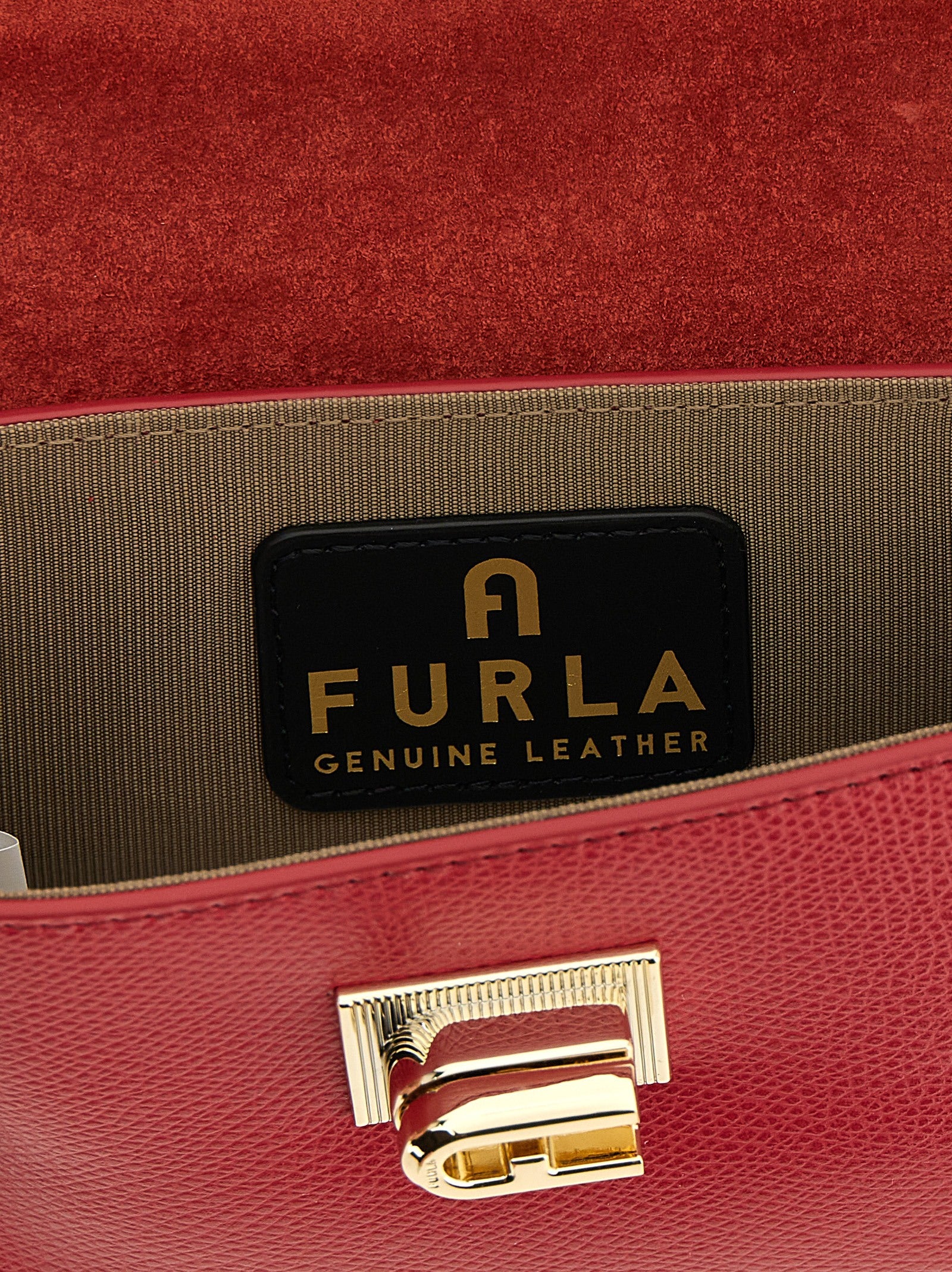 Elevate your style with the Furla Multicolor Calfskin Crossbody Bag, a timeless accessory crafted from exquisite calfskin leather, embodying luxury and sophistication.