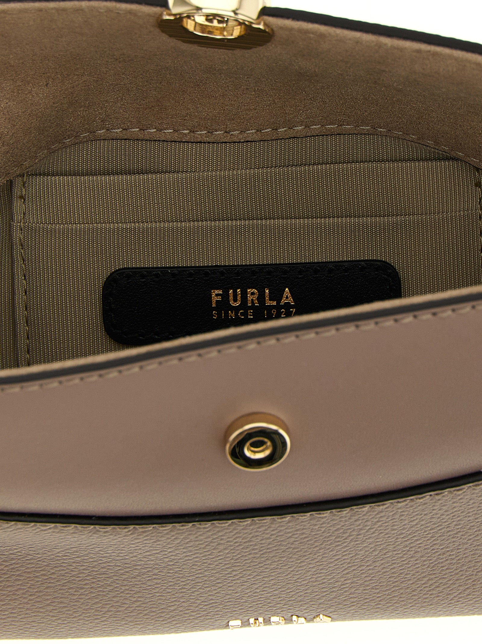 Elevate your style with the Furla Boston Nicole Mini Handbag, a luxurious gray calfskin masterpiece that embodies sophistication and timeless elegance.