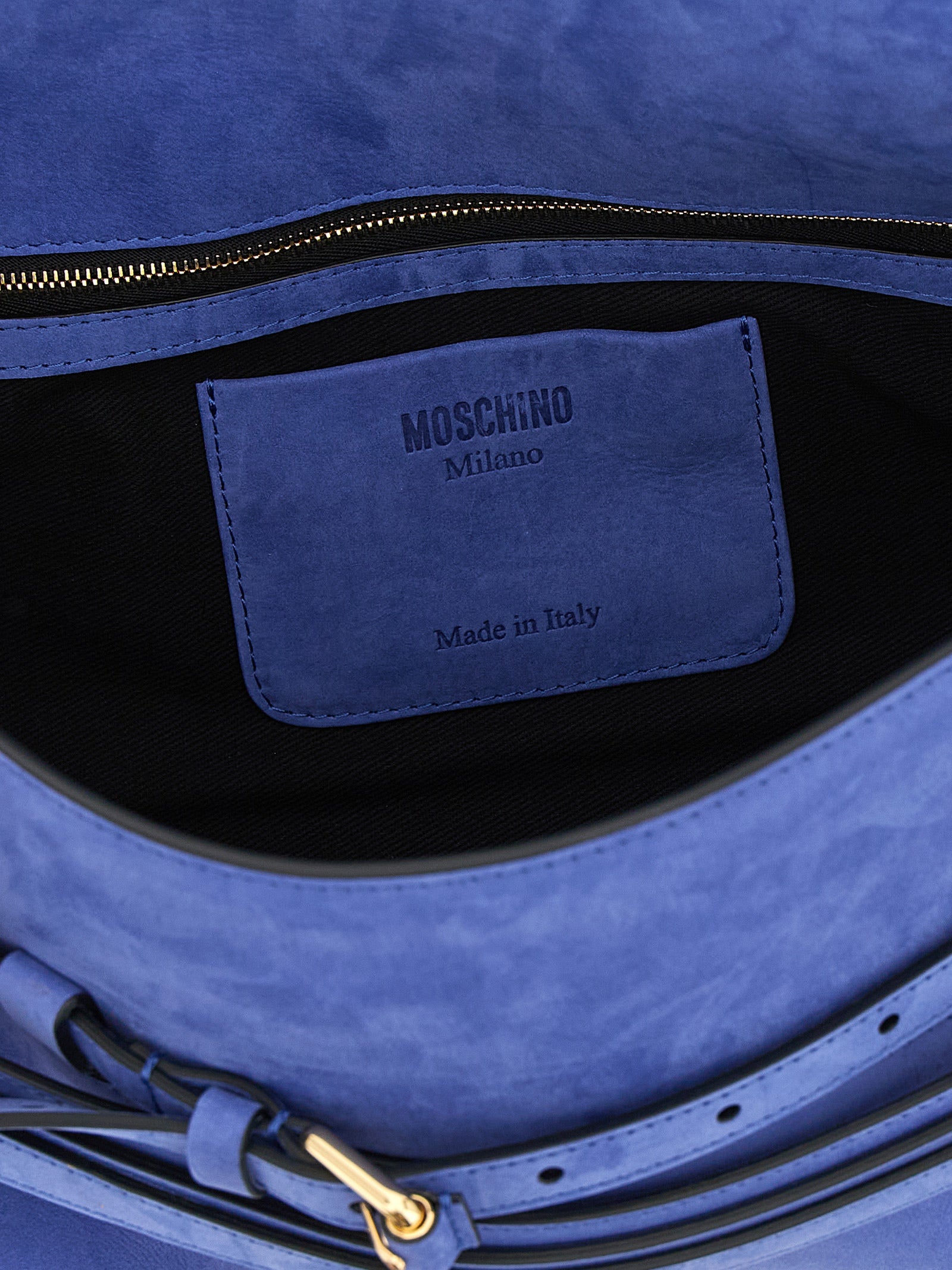 Indulge in the Moschino Blue Calfskin Shoulder Bag, a masterpiece of Italian craftsmanship, blending luxury and artistry for the discerning connoisseur.
