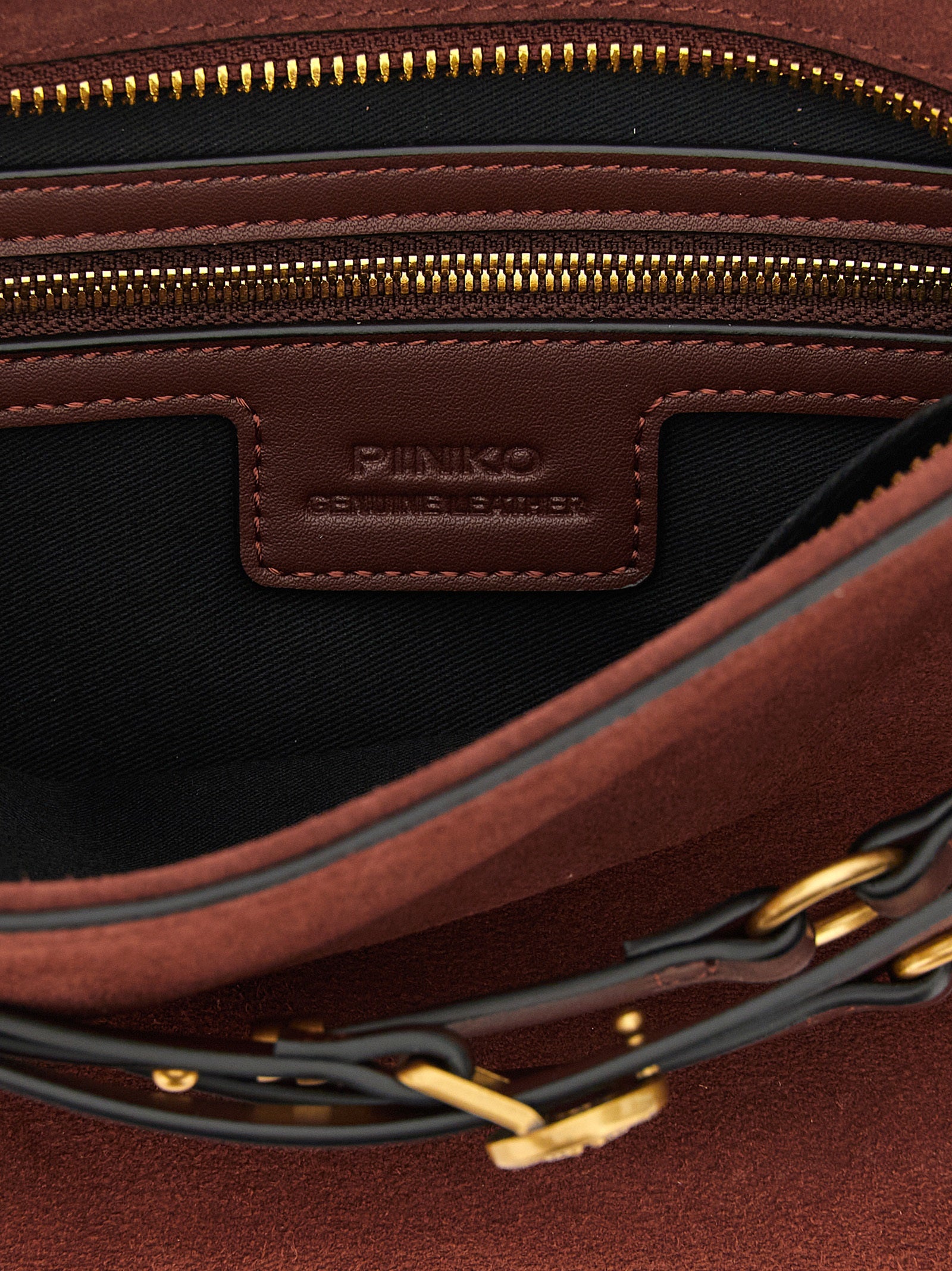 Discover the PINKO Bordeaux Lamb Leather Shoulder Bag, a masterpiece of artisanal luxury and timeless elegance, perfect for elevating any sophisticated ensemble.
