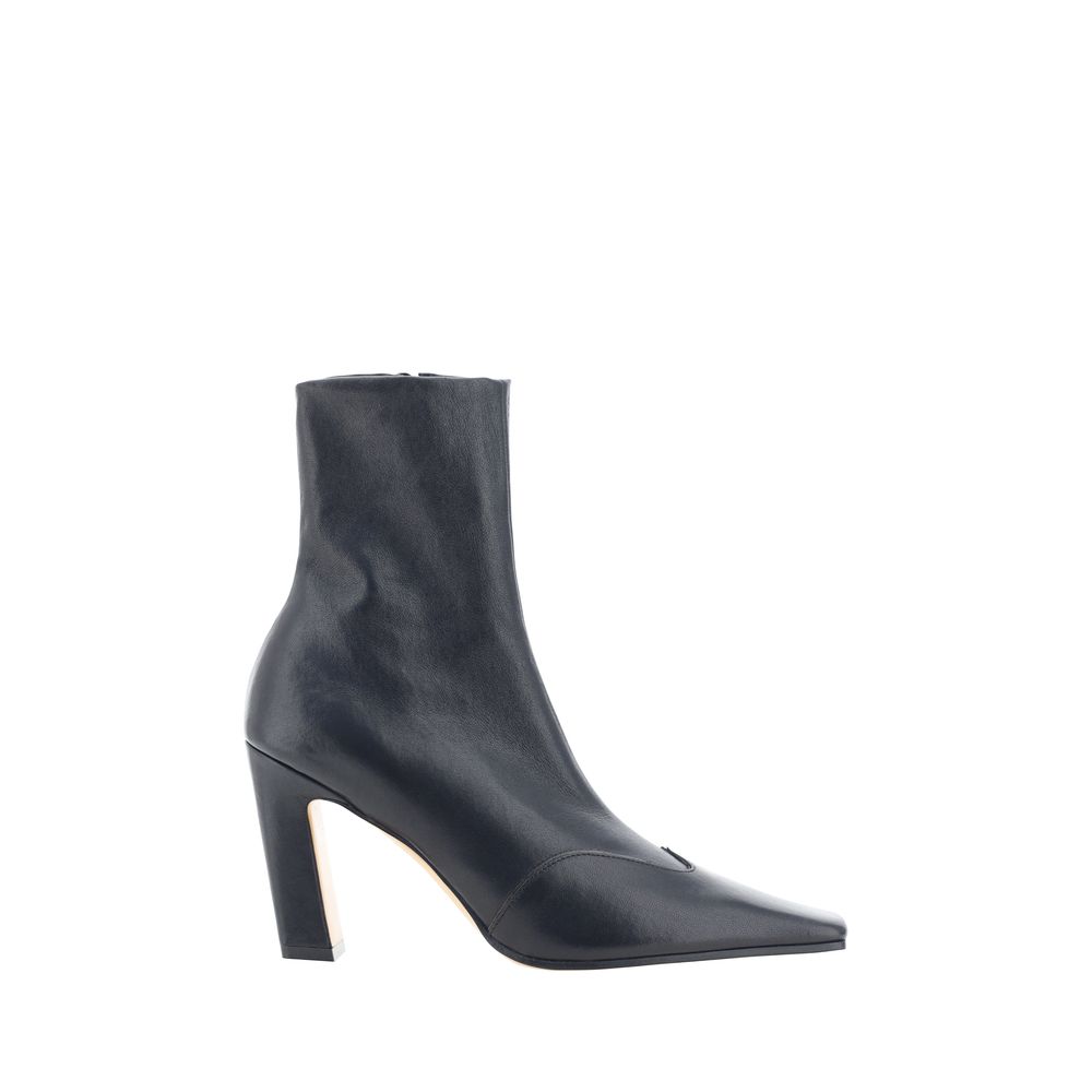Elevate your elegance with Khaite's Black Calf Leather Bos Taurus Ankle Boots, a fusion of artisanal luxury and bold design, perfect for the discerning connoisseur.