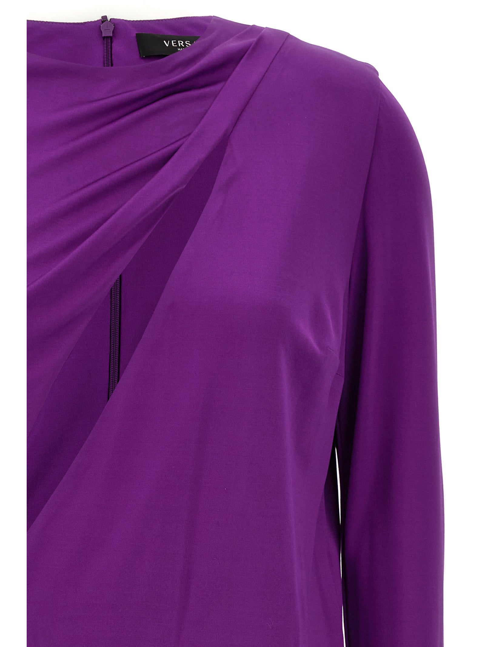 Indulge in the Versace Purple Viscose Short Dress, a masterpiece of haute couture elegance crafted in Italy, where luxurious draping and striking cut-outs redefine sophistication.