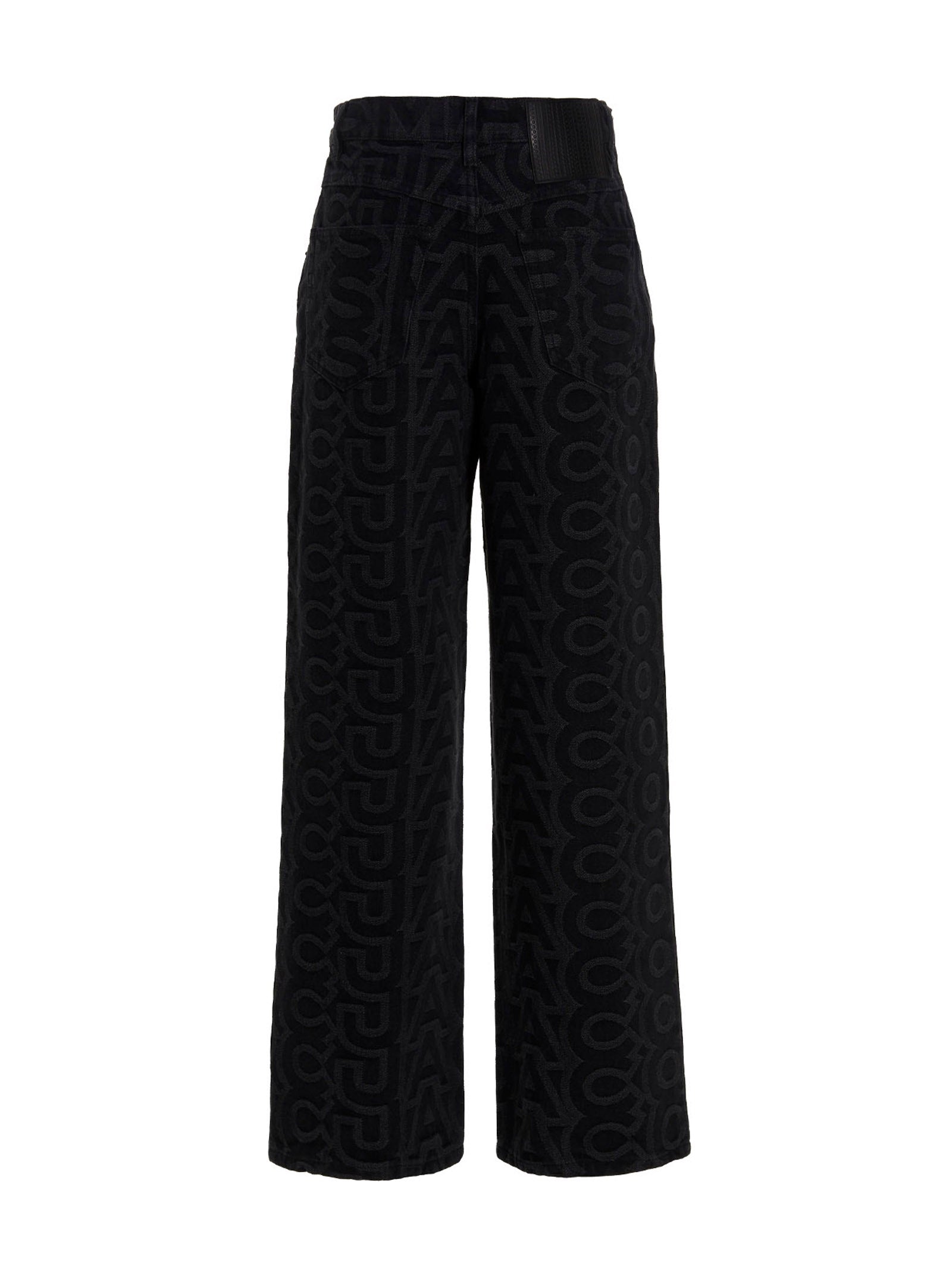 Discover the elegance of Marc Jacobs Black Cotton Jeans, a luxurious blend of artisanal craftsmanship and contemporary style, perfect for the discerning fashion connoisseur.
