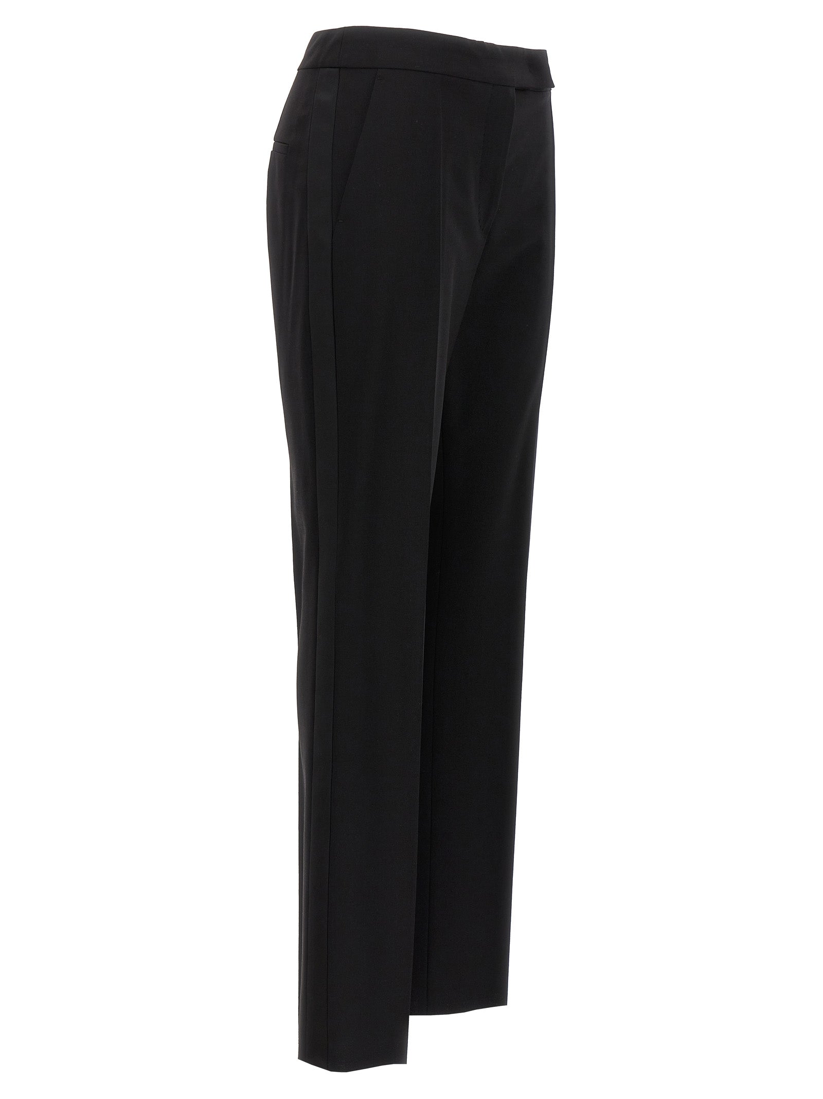 Elevate your wardrobe with Max Mara's Black Virgin Wool Dress Pants, a masterpiece of Italian craftsmanship that exudes timeless elegance and sophisticated allure.