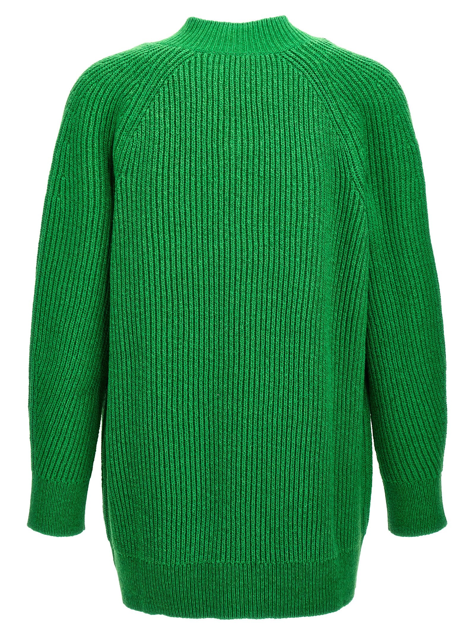 Discover the Jil Sander Bicolor Cotton Cardigan, a luxurious blend of cotton and wool, embodying timeless elegance and sophisticated comfort for the discerning individual.