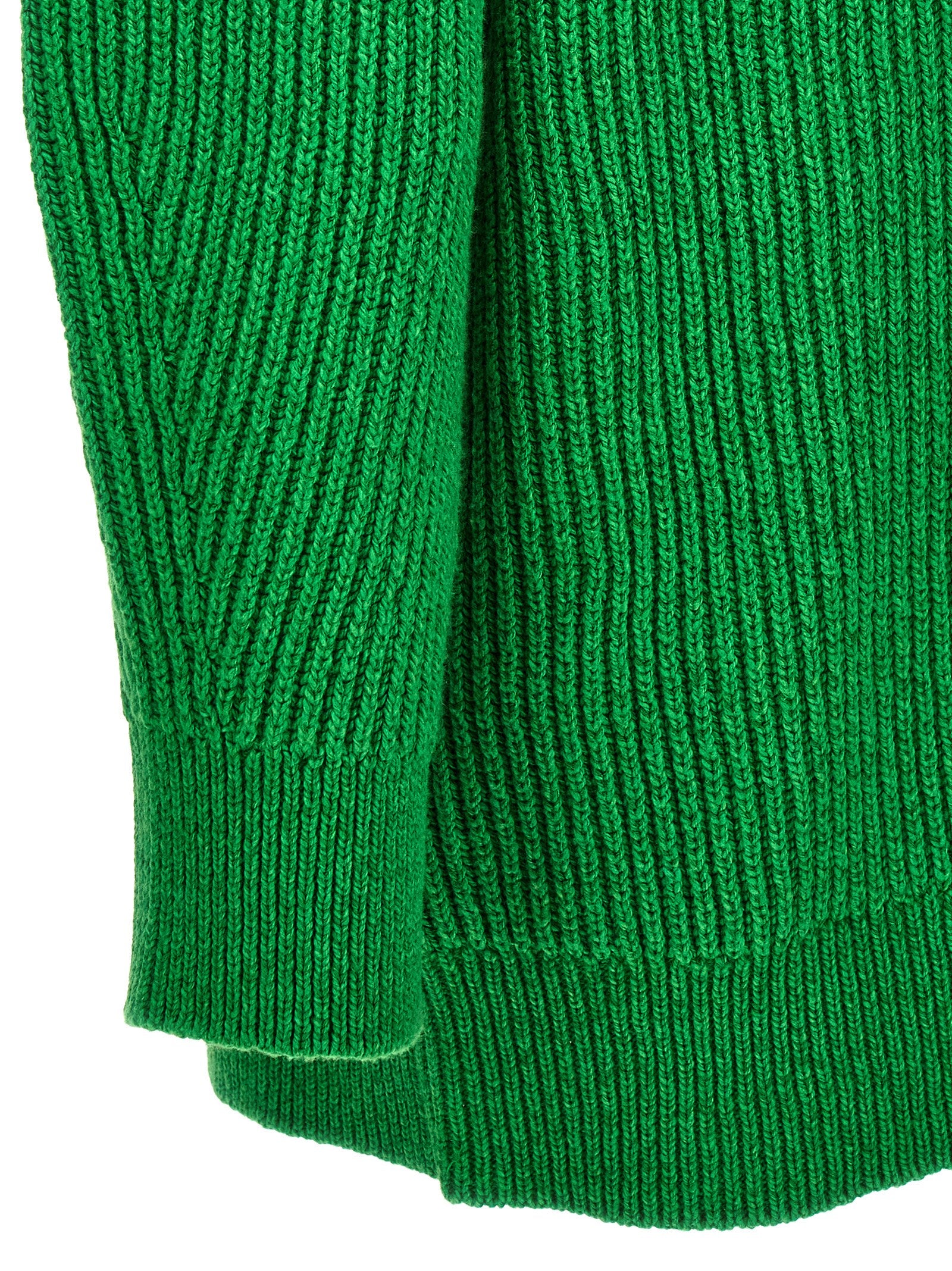 Experience the exquisite Jil Sander Bicolor Cotton Cardigan, a luxurious blend of cotton and wool, embodying timeless elegance and sophisticated comfort for discerning individuals.