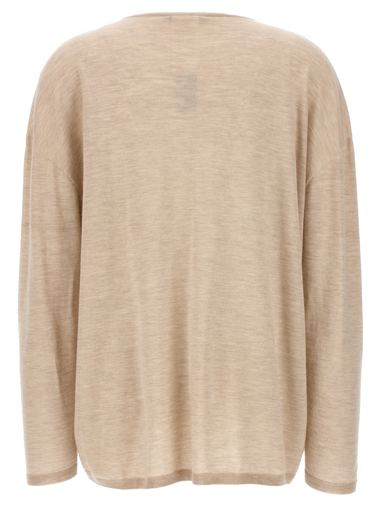 Experience the sublime elegance of the Max Mara Beige Cashmere Cardigan, a timeless piece crafted from 100% cashmere, embodying Italian luxury and sophistication.
