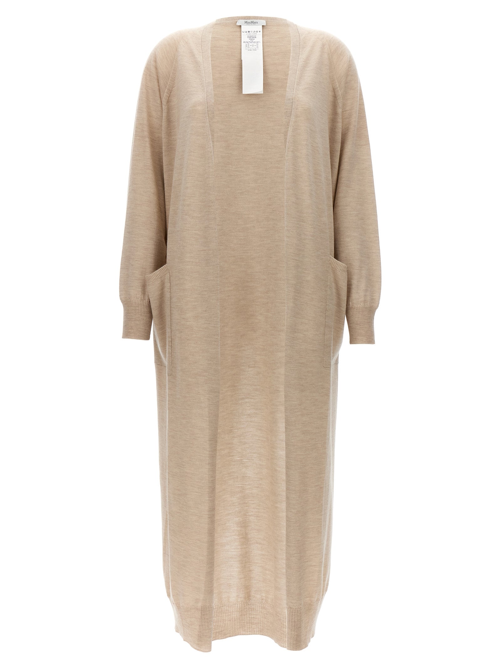 Experience the allure of the Max Mara Beige Cashmere Cardigan, a timeless piece crafted in Italy from luxurious cashmere, embodying elegance and sophistication for the discerning wardrobe.