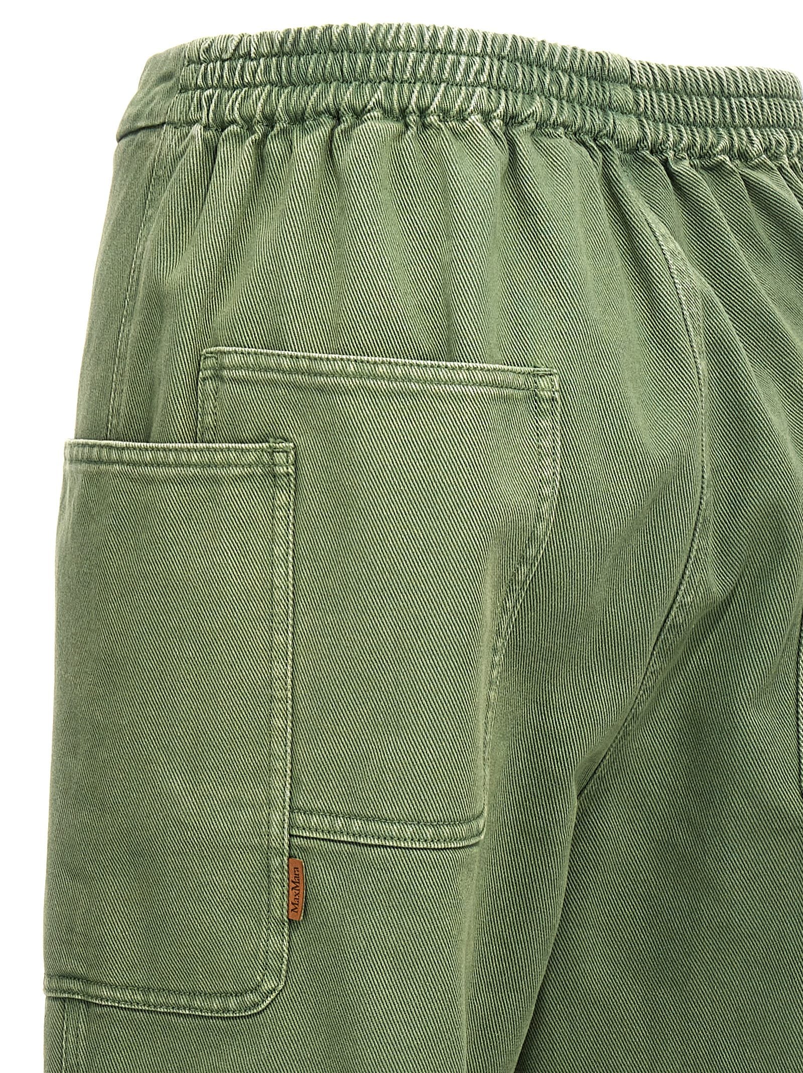 Elevate your wardrobe with Max Mara's Bicolor Cotton Casual Pants, where exquisite craftsmanship meets bold elegance, perfect for the discerning individual.