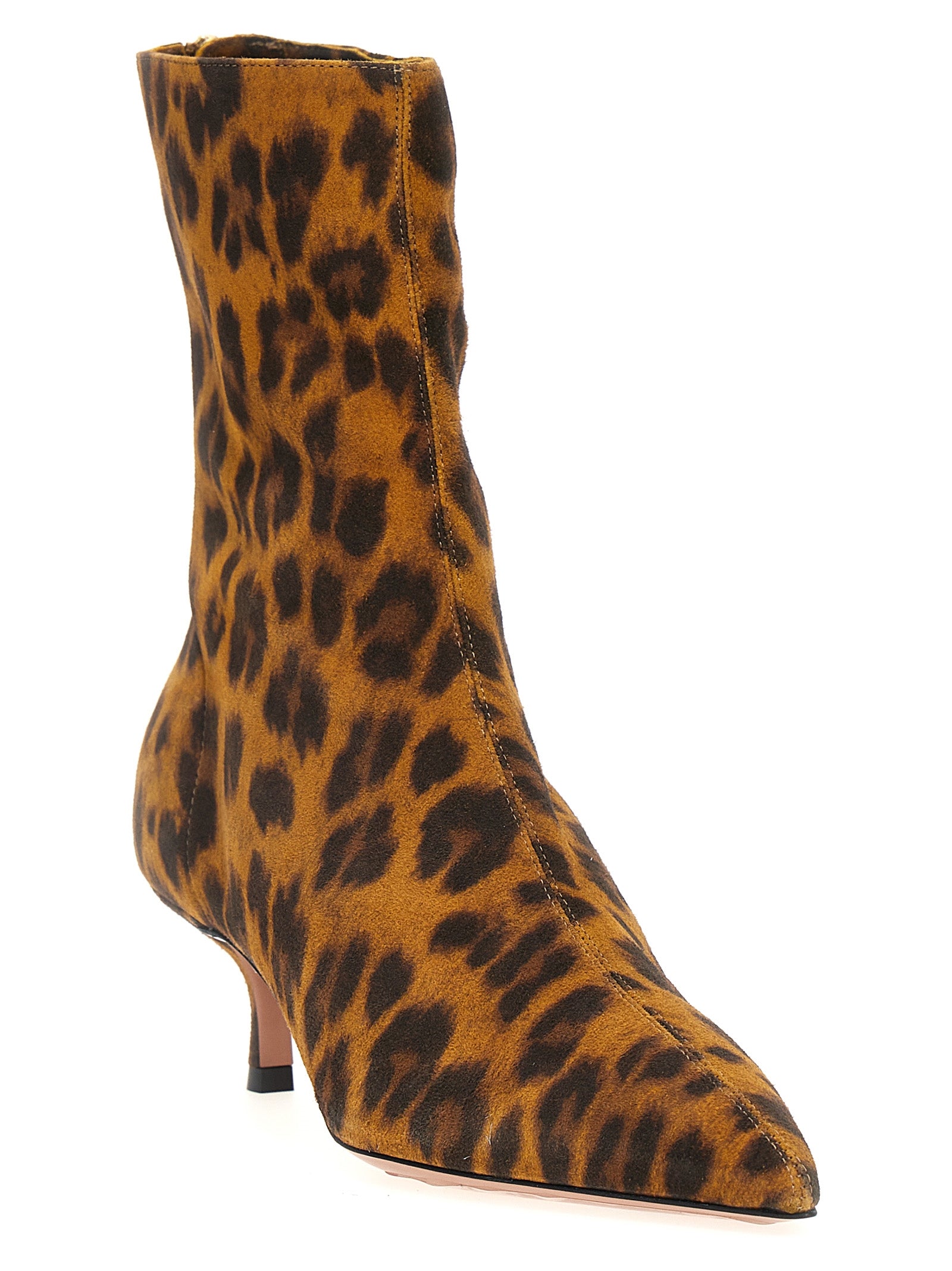 Step into the allure of Aquazzura's Montmartre leopard ankle boots, crafted from sumptuous suede, embodying luxury and bold elegance for the discerning individual.