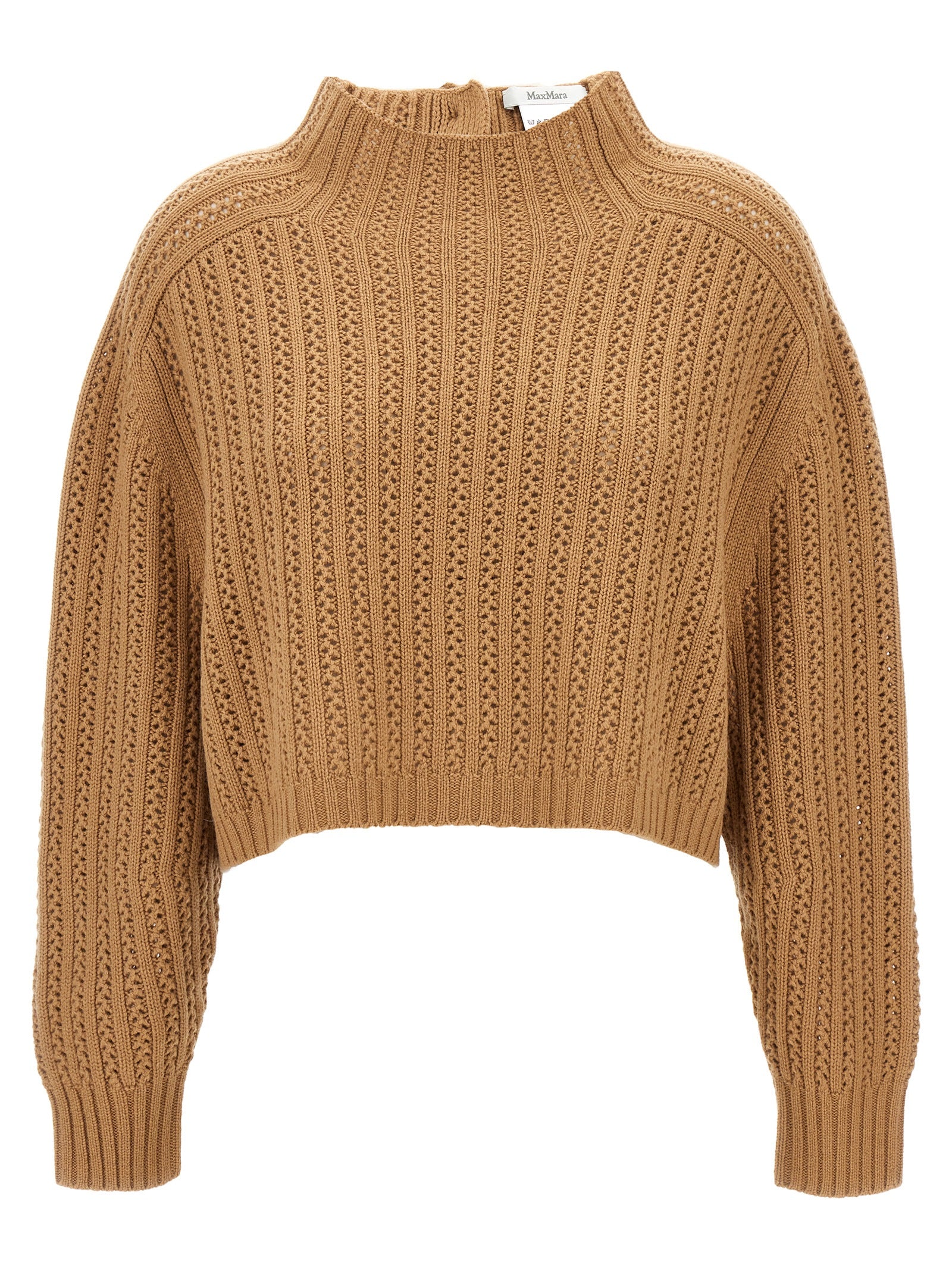Experience the allure of the Max Mara Beige Wool Cardigan, a luxurious blend of wool and cashmere, embodying artisanal elegance for timeless sophistication.