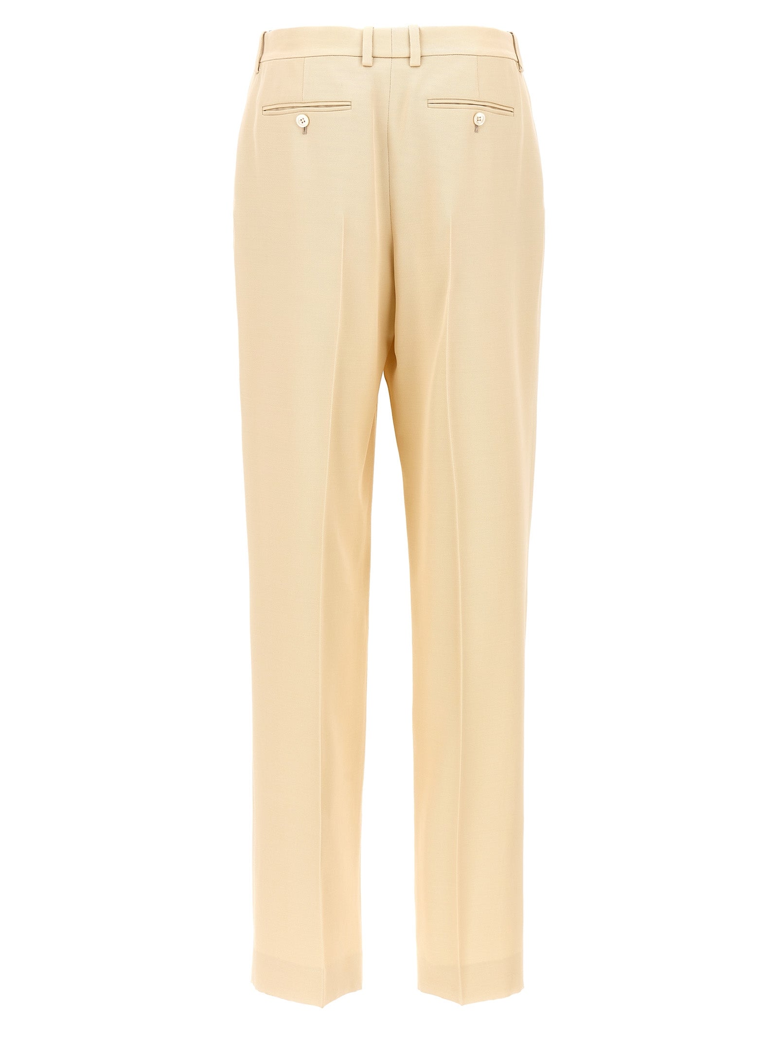 Elevate your elegance with Tom Ford's Beige Silk Dress Pants, a luxurious blend of silk and wool, embodying artisanal craftsmanship and timeless sophistication.
