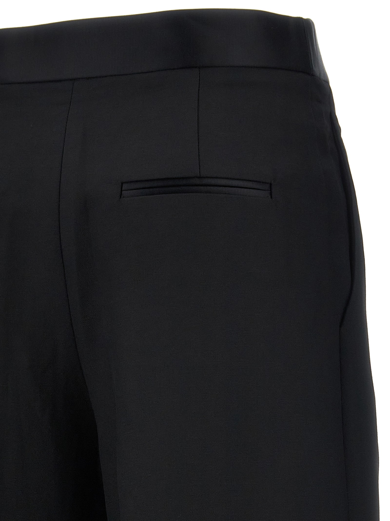 Elevate your wardrobe with Khaite's Black Viscose Casual Pants, a luxurious blend of elegance and comfort, perfect for the discerning individual who appreciates refined style.