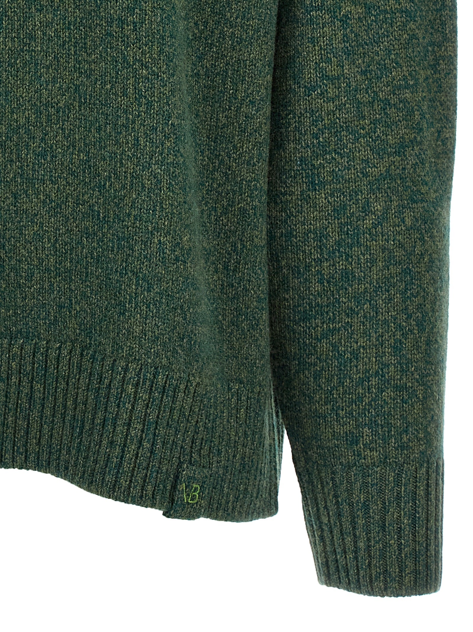 Experience the allure of the Victoria Beckham Bicolor Wool Cardigan, a luxurious blend of wool and cashmere that epitomizes timeless elegance and sophisticated versatility.