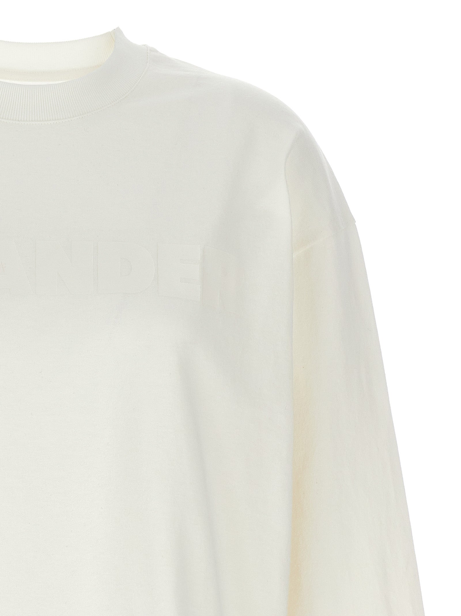 Experience the allure of the Jil Sander White Cotton Long Sleeve T-Shirt, a masterpiece of Italian craftsmanship that embodies timeless elegance and refined comfort.