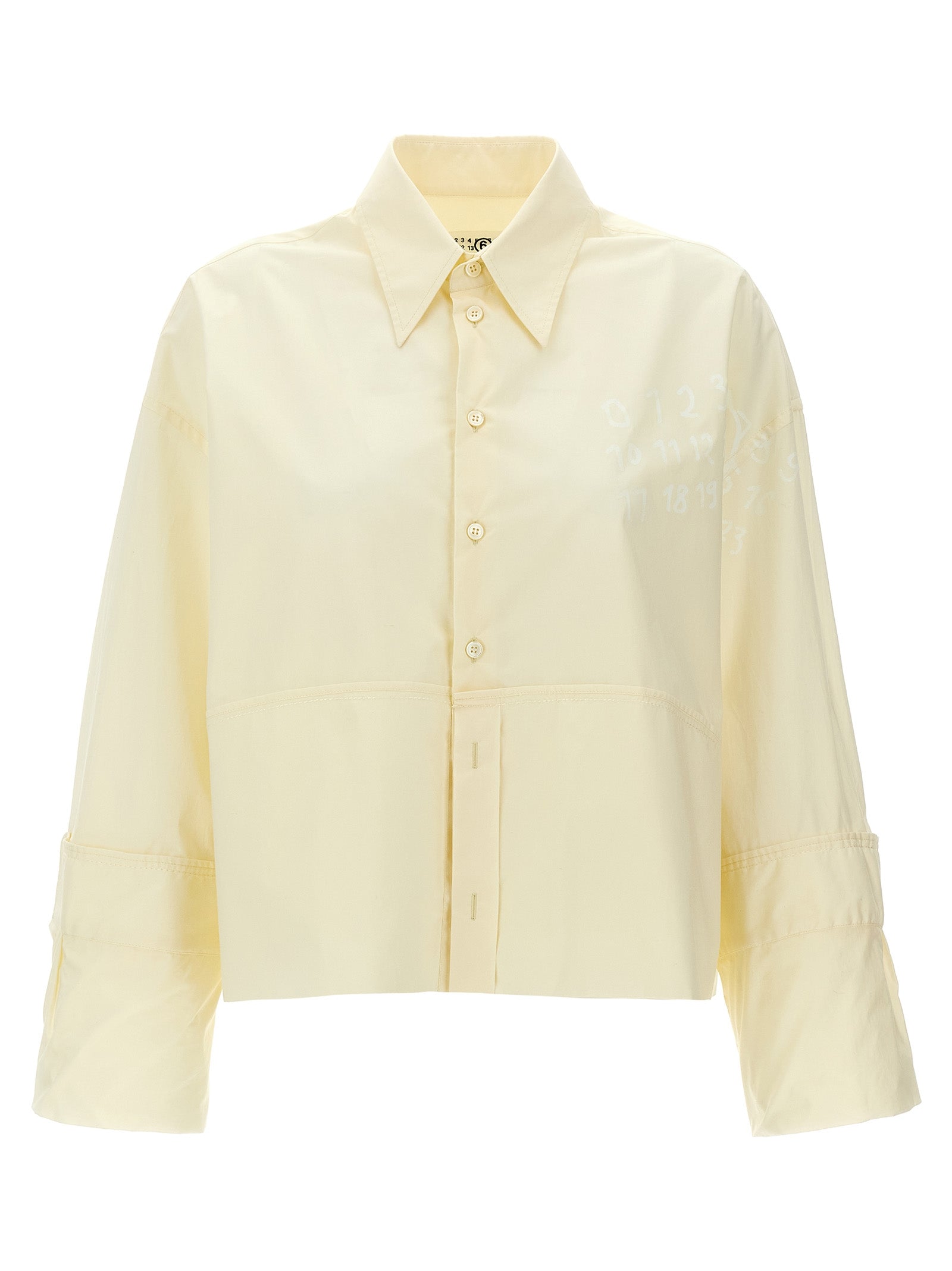 Elevate your style with the MM6 Maison Margiela White Cotton Blouse, a luxurious blend of avant-garde design and exquisite craftsmanship, perfect for any sophisticated occasion.