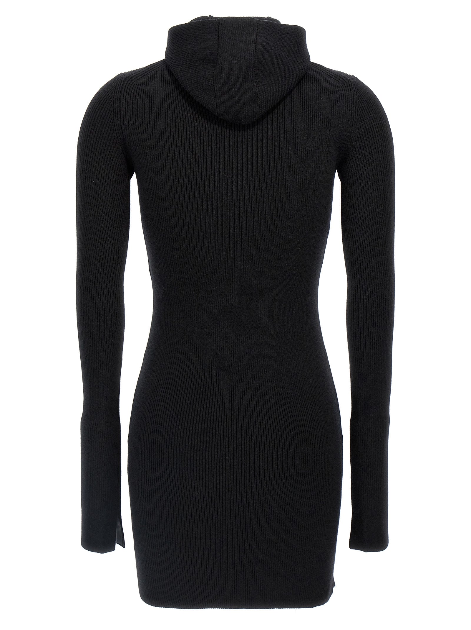 Elevate your wardrobe with the Fendi Black Wool Short Dress, a luxurious blend of wool and silk, embodying sophistication and modern elegance for the discerning fashionista.