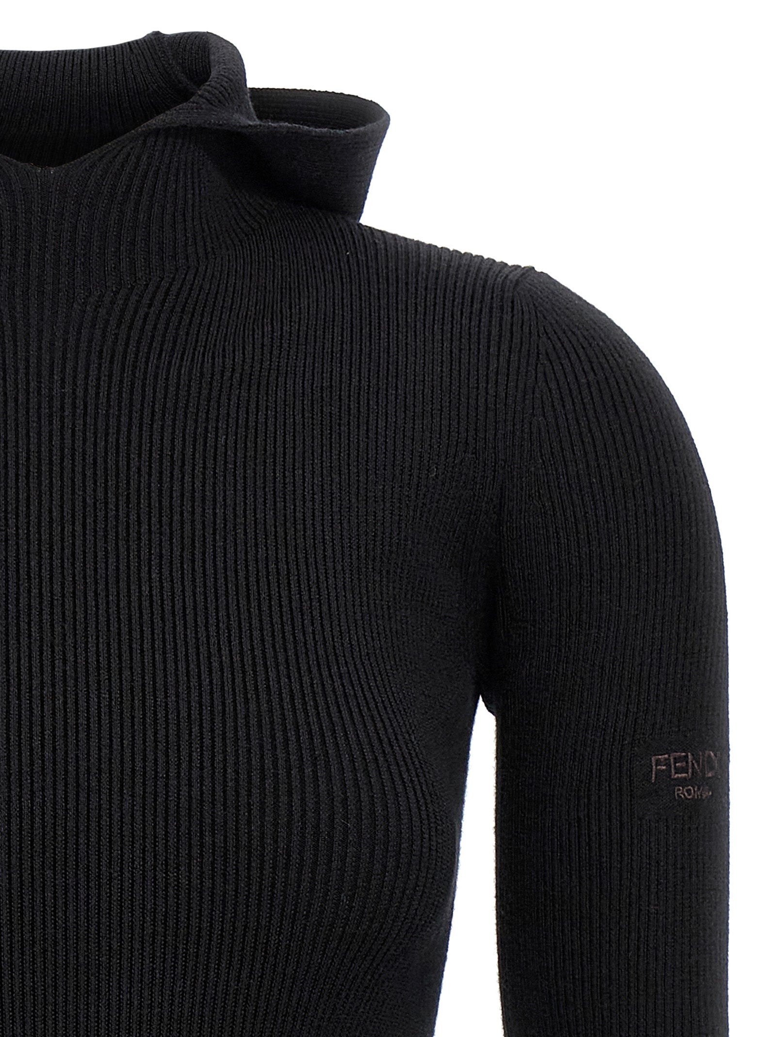 Experience the allure of the Fendi Black Wool Short Dress, a luxurious blend of wool and silk, embodying sophistication and modern elegance for the discerning connoisseur.