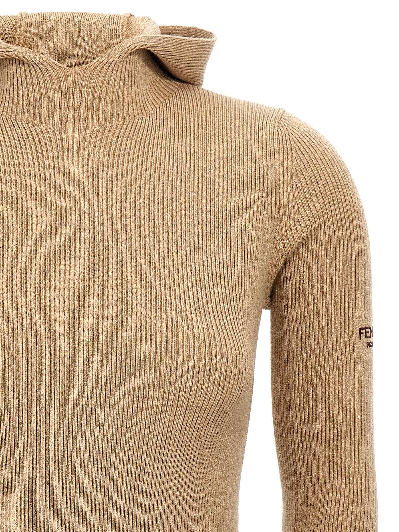 Experience the exquisite allure of Fendi's Beige Wool Short Dress, a luxurious blend of wool and silk that redefines sophistication for the discerning individual.