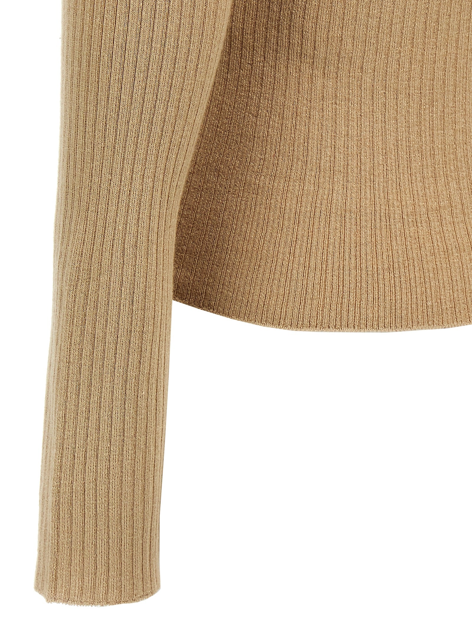 Indulge in the Max Mara Beige Silk Cardigan, a luxurious blend of silk and cashmere, embodying timeless elegance and exquisite craftsmanship for the discerning individual.