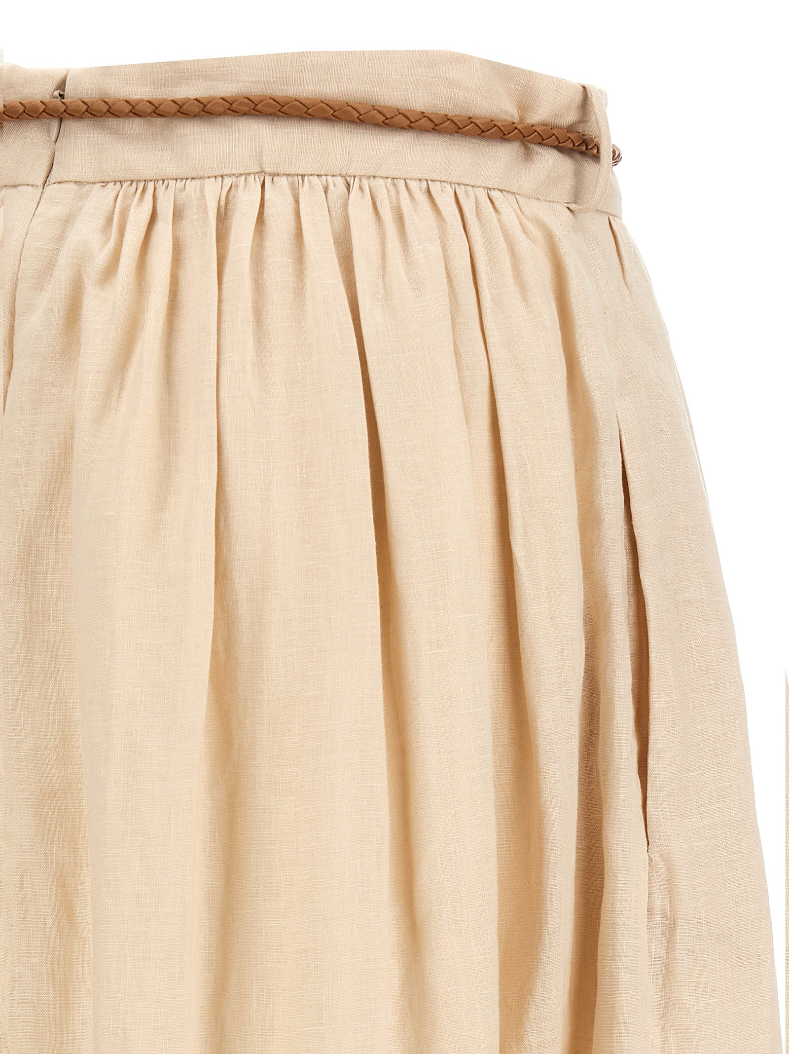 Elevate your wardrobe with the Zimmermann Beige Linen Midi Skirt from the Wylie collection, showcasing exquisite embroidery and luxurious craftsmanship for timeless sophistication.