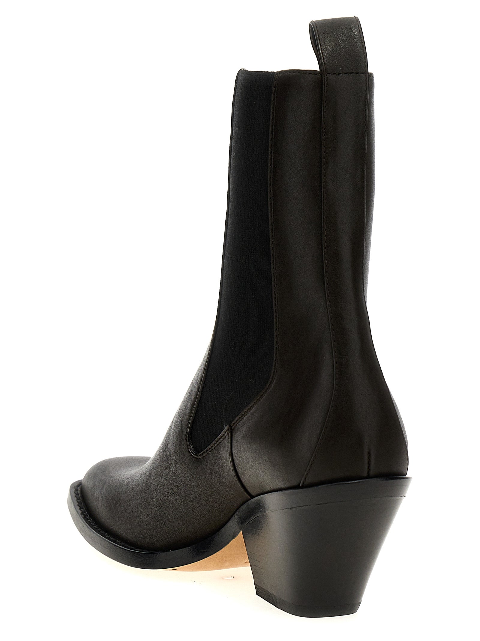 Step into unparalleled elegance with Khaite's Brown Calfskin Chelsea Boots, where artisanal craftsmanship meets timeless luxury for the discerning individual.