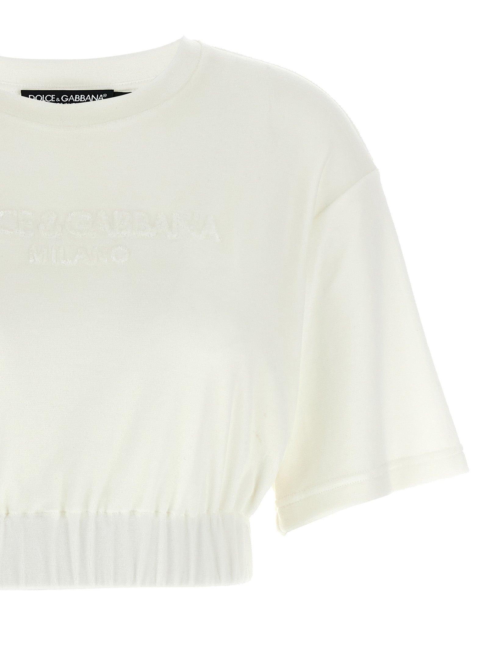 Indulge in the Dolce & Gabbana White Cotton T-Shirt, a luxurious blend of comfort and elegance, crafted in Italy for the discerning fashion connoisseur.