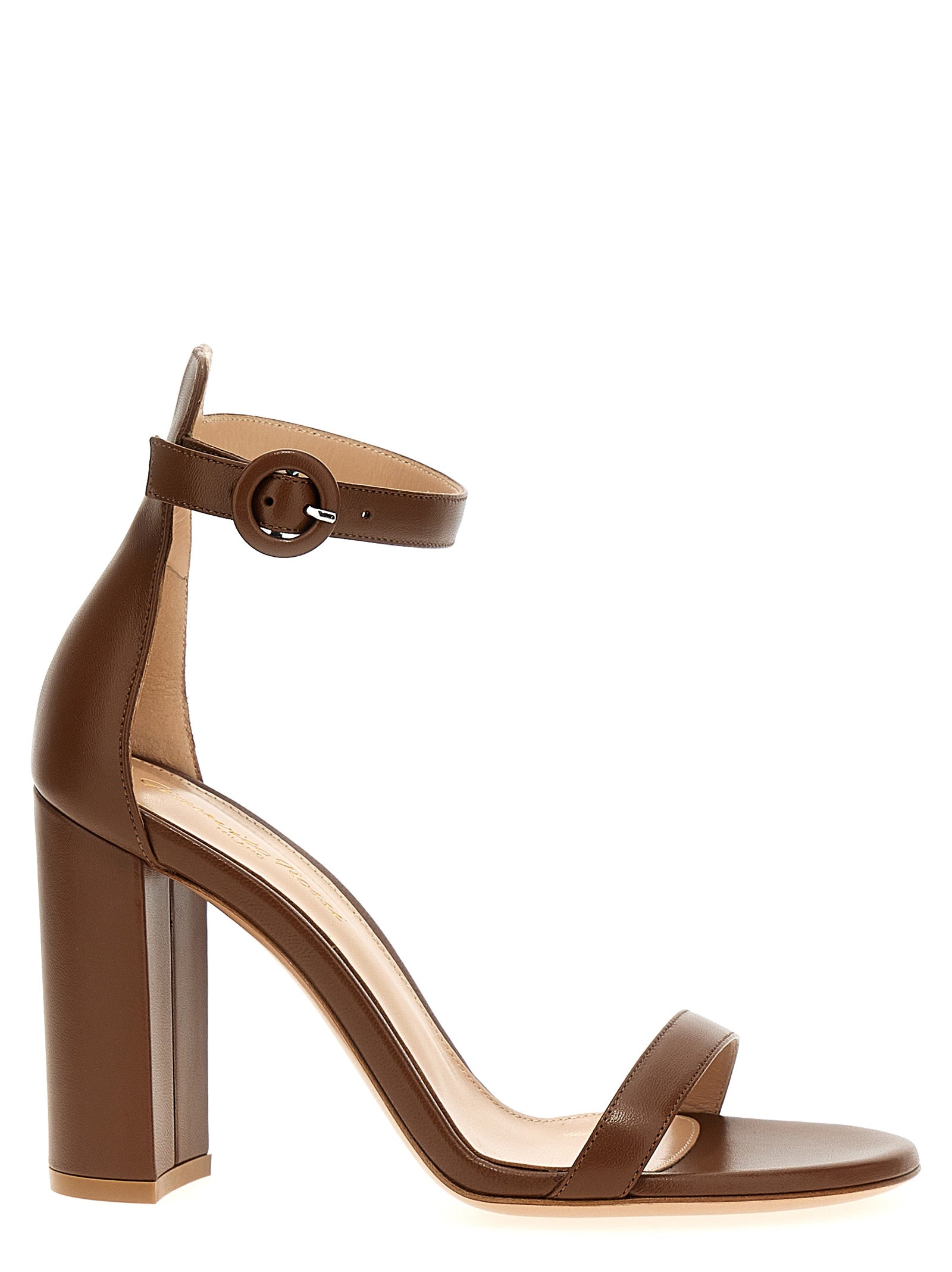 Experience the exquisite allure of Gianvito Rossi's brown goatskin stiletto heel sandals, a perfect blend of artisanal craftsmanship and timeless elegance, elevating every occasion.