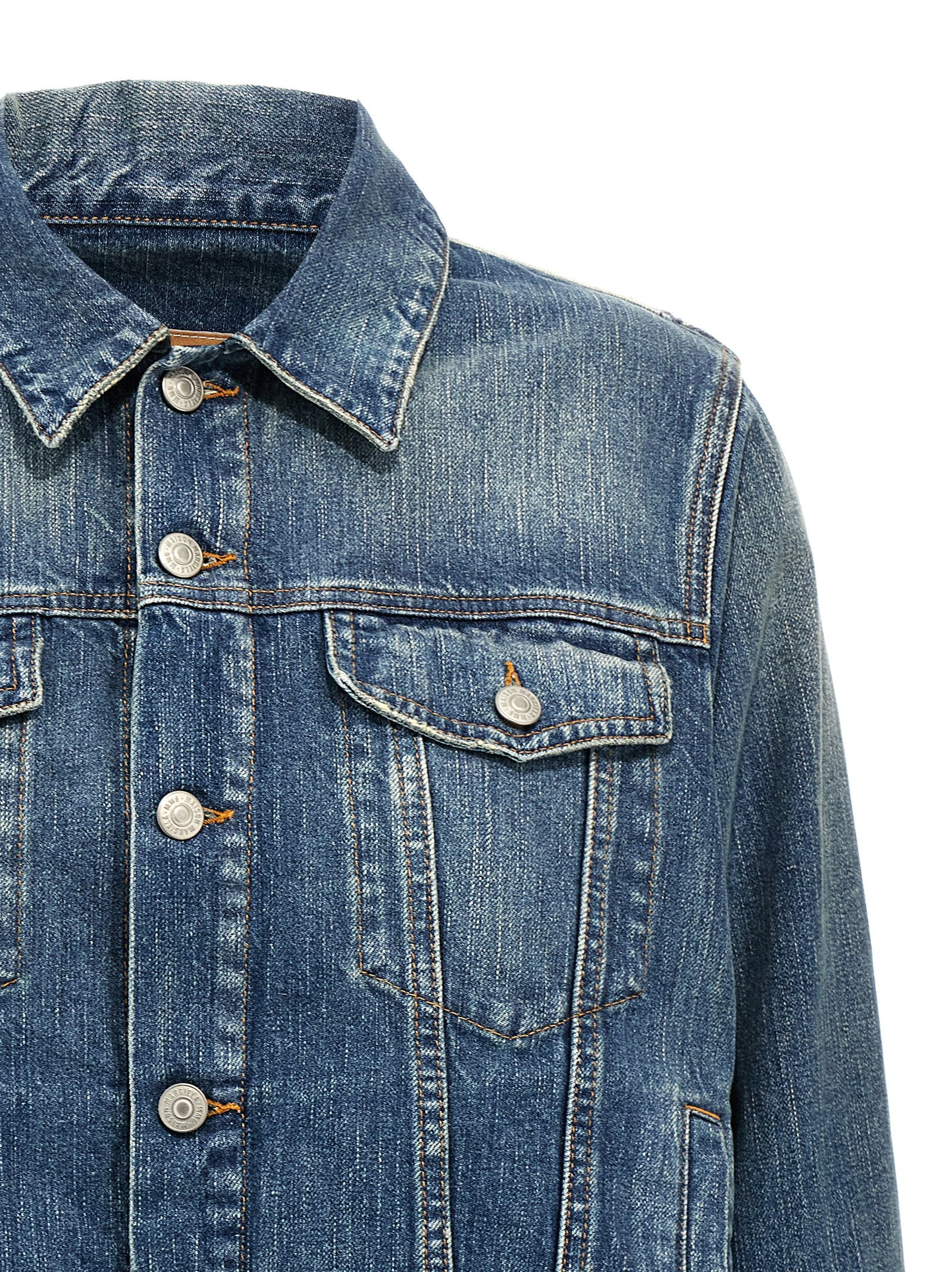 Discover the MM6 Maison Margiela Blue Cotton Denim Jacket, a luxurious blend of avant-garde design and timeless craftsmanship, perfect for those who embody elegance and confidence.