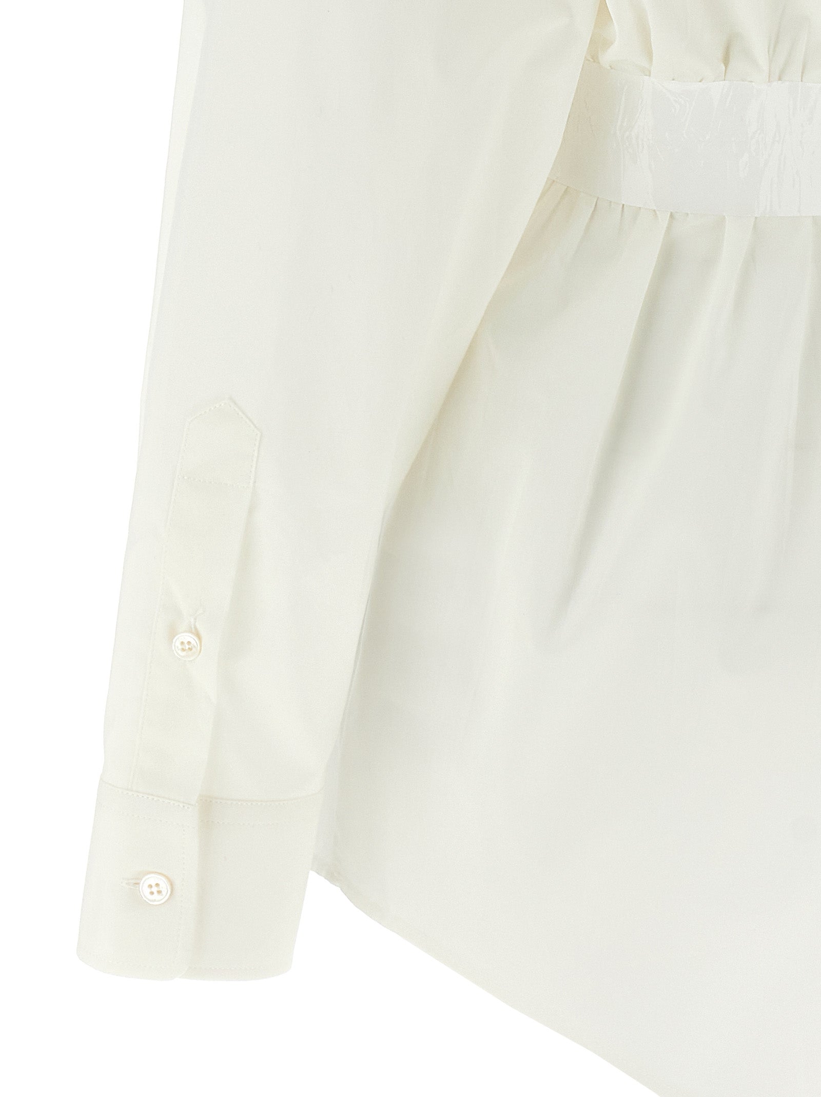 Elevate your wardrobe with the MM6 Maison Margiela White Cotton Blouse, a masterpiece of couture elegance, crafted from luxurious cotton for timeless sophistication.