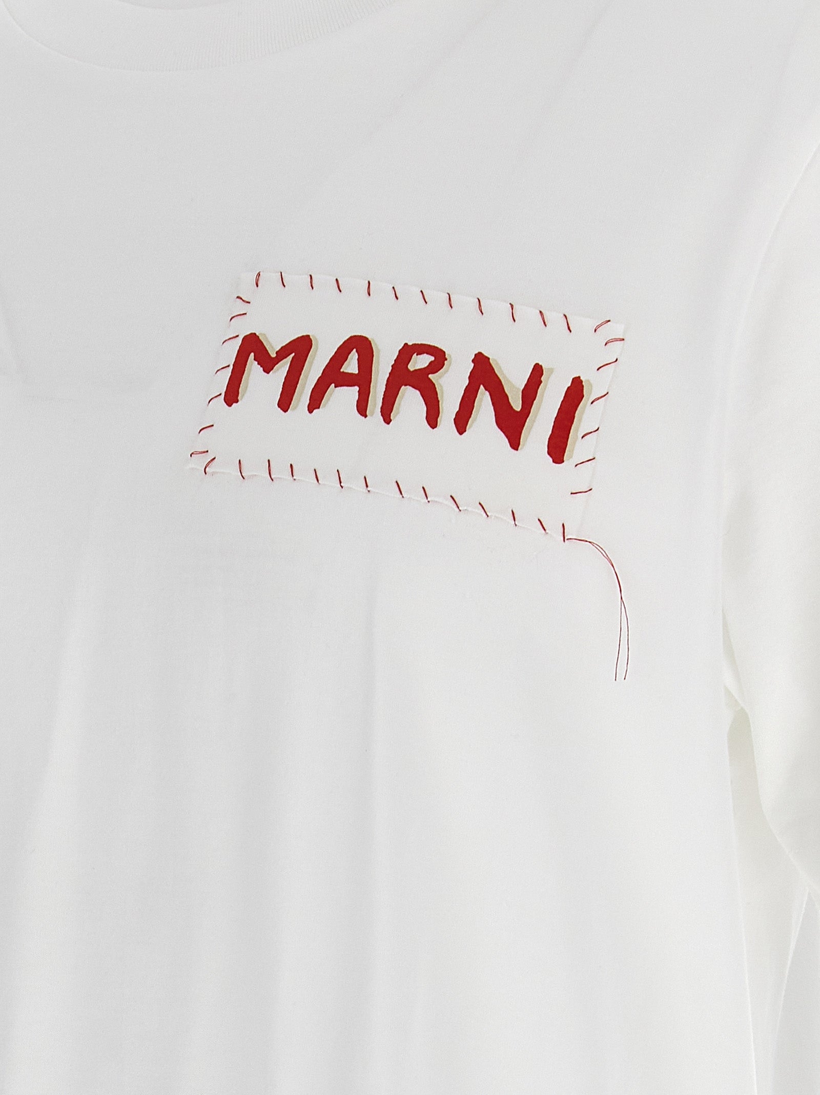 Elevate your wardrobe with the MARNI White Cotton T-Shirt, a luxurious blend of comfort and style, perfect for the discerning individual who embraces sophistication.