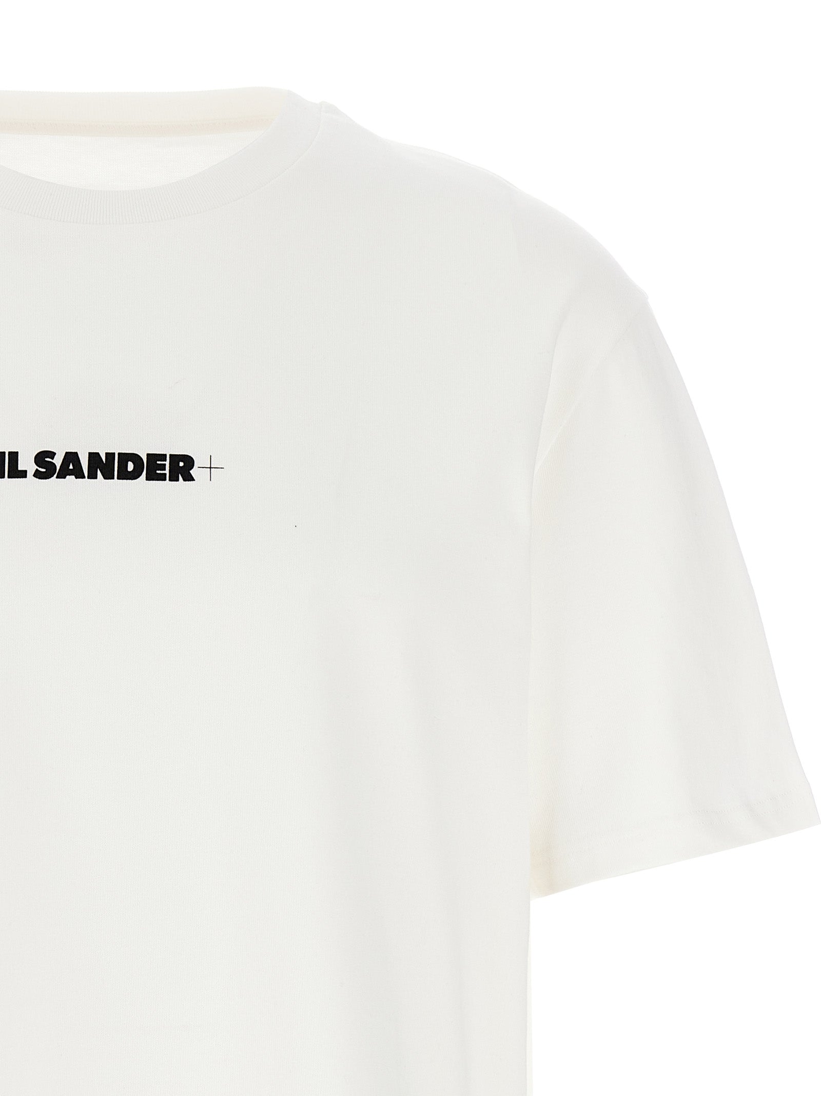 Discover the Jil Sander White Cotton T-Shirt, a luxurious blend of comfort and elegance, crafted in Italy for the discerning individual who values sophistication.