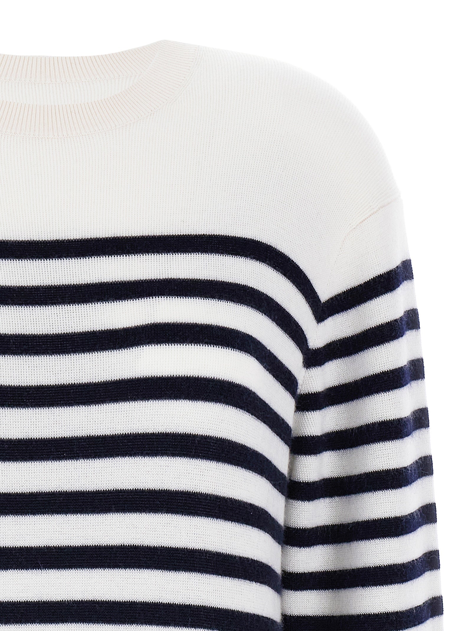 Indulge in the Khaite Bicolor Cashmere Cardigan, a luxurious blend of Mongolian cashmere and elastane, designed for timeless elegance and effortless sophistication.