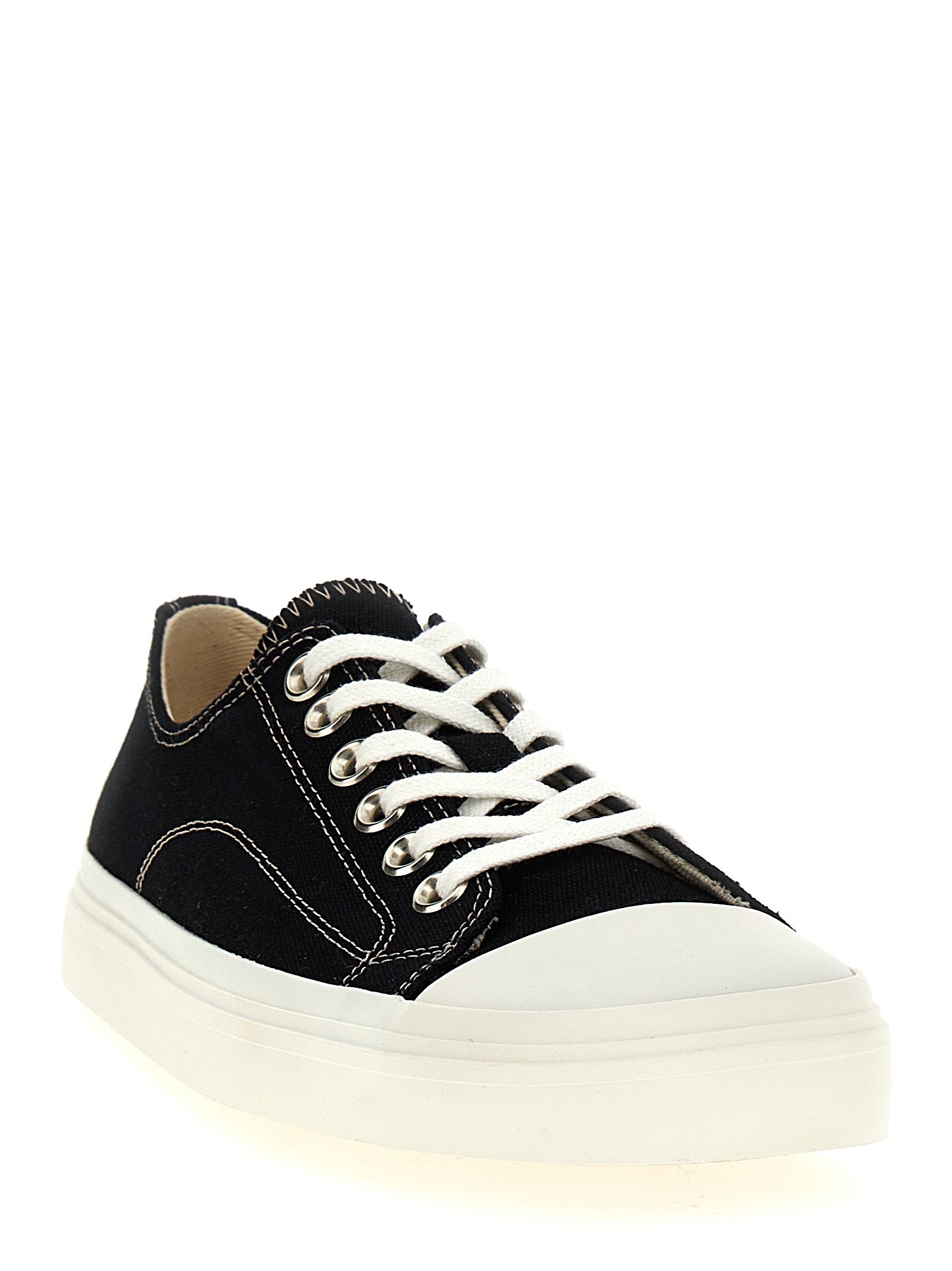 Discover the Moschino Black Cotton Low Top Sneakers, where exquisite craftsmanship meets bold elegance, perfect for the discerning trendsetter seeking luxury and style.