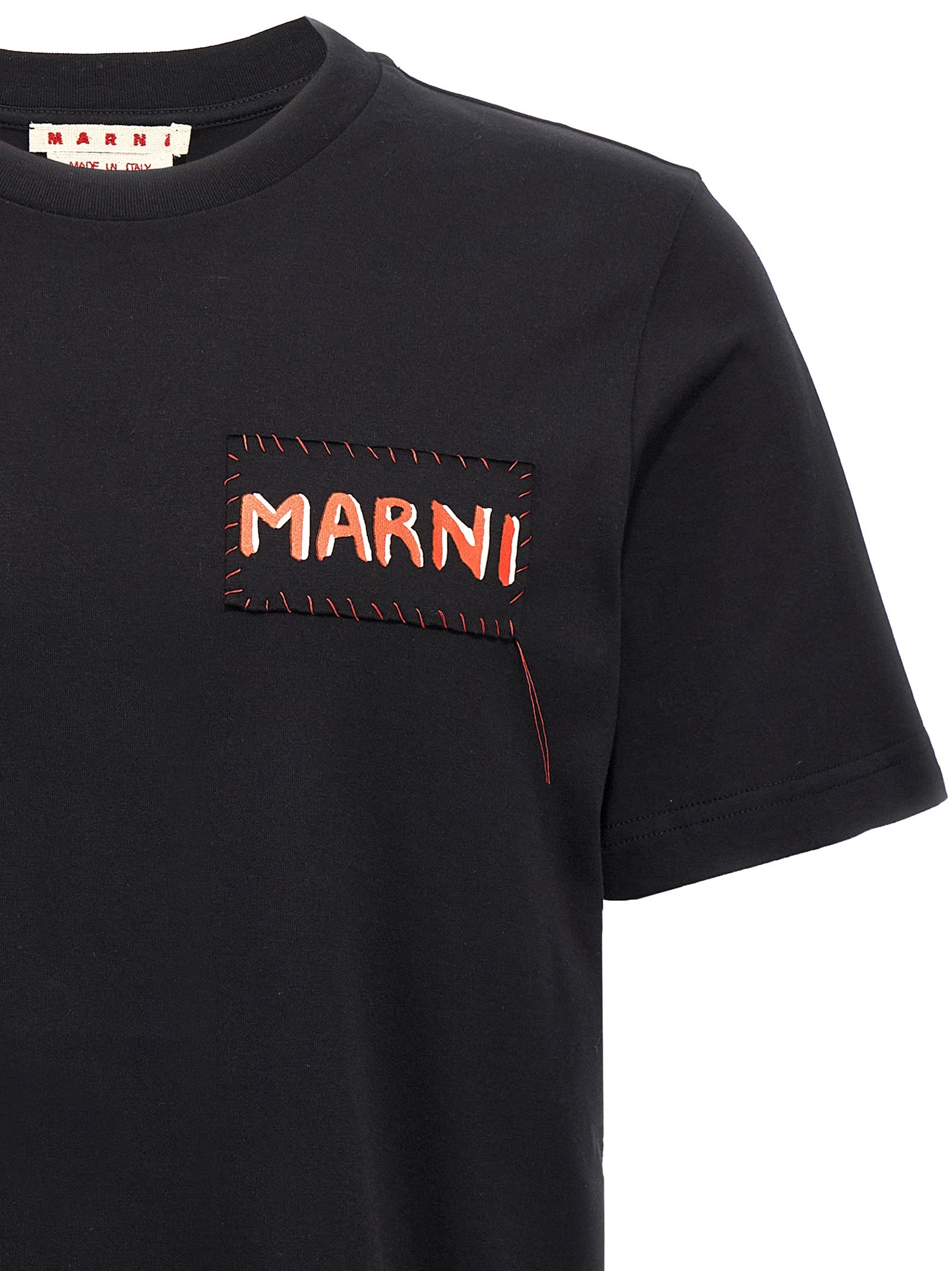 Elevate your wardrobe with the Marni Black Cotton T-Shirt, a luxurious essential crafted in Italy, blending sophistication and comfort for the discerning individual.