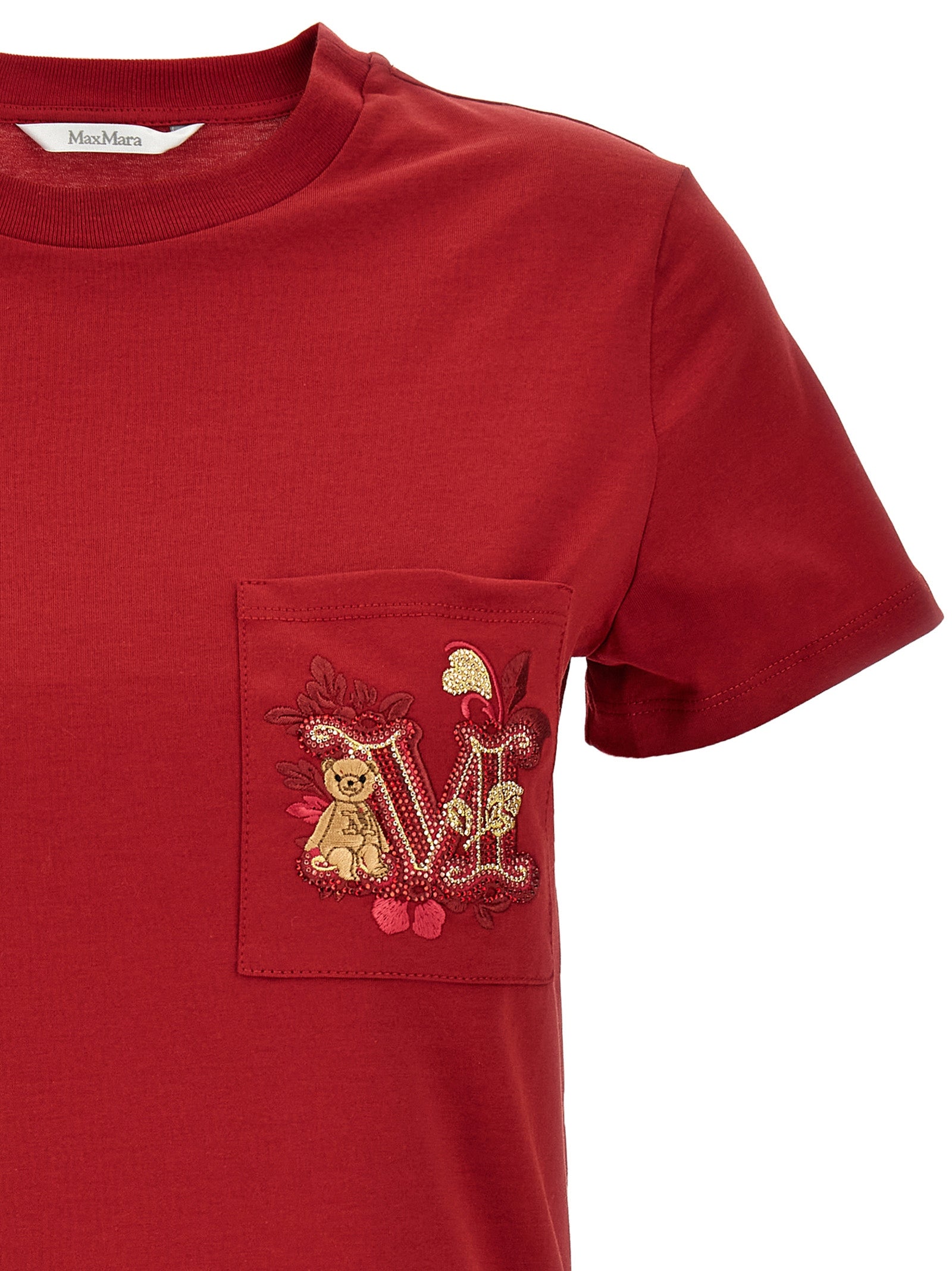 Elevate your wardrobe with the Max Mara Nunzio T-shirt, a luxurious blend of 100% cotton and exquisite details that embody timeless elegance and sophistication.