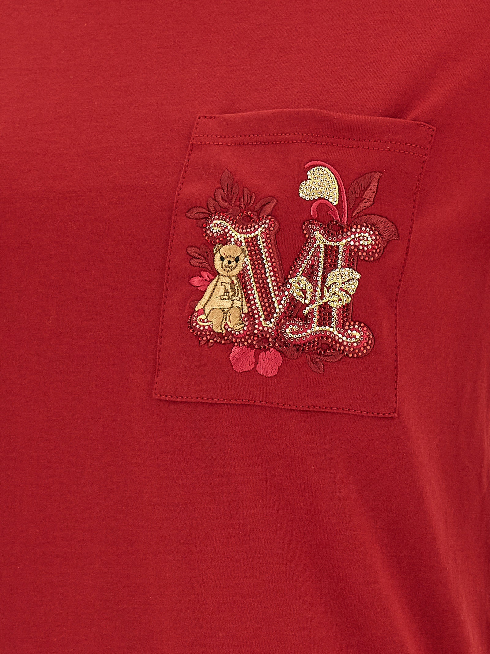 Elevate your wardrobe with the Max Mara Nunzio T-shirt, a luxurious blend of 100% cotton and exquisite details, embodying timeless elegance and refined taste.