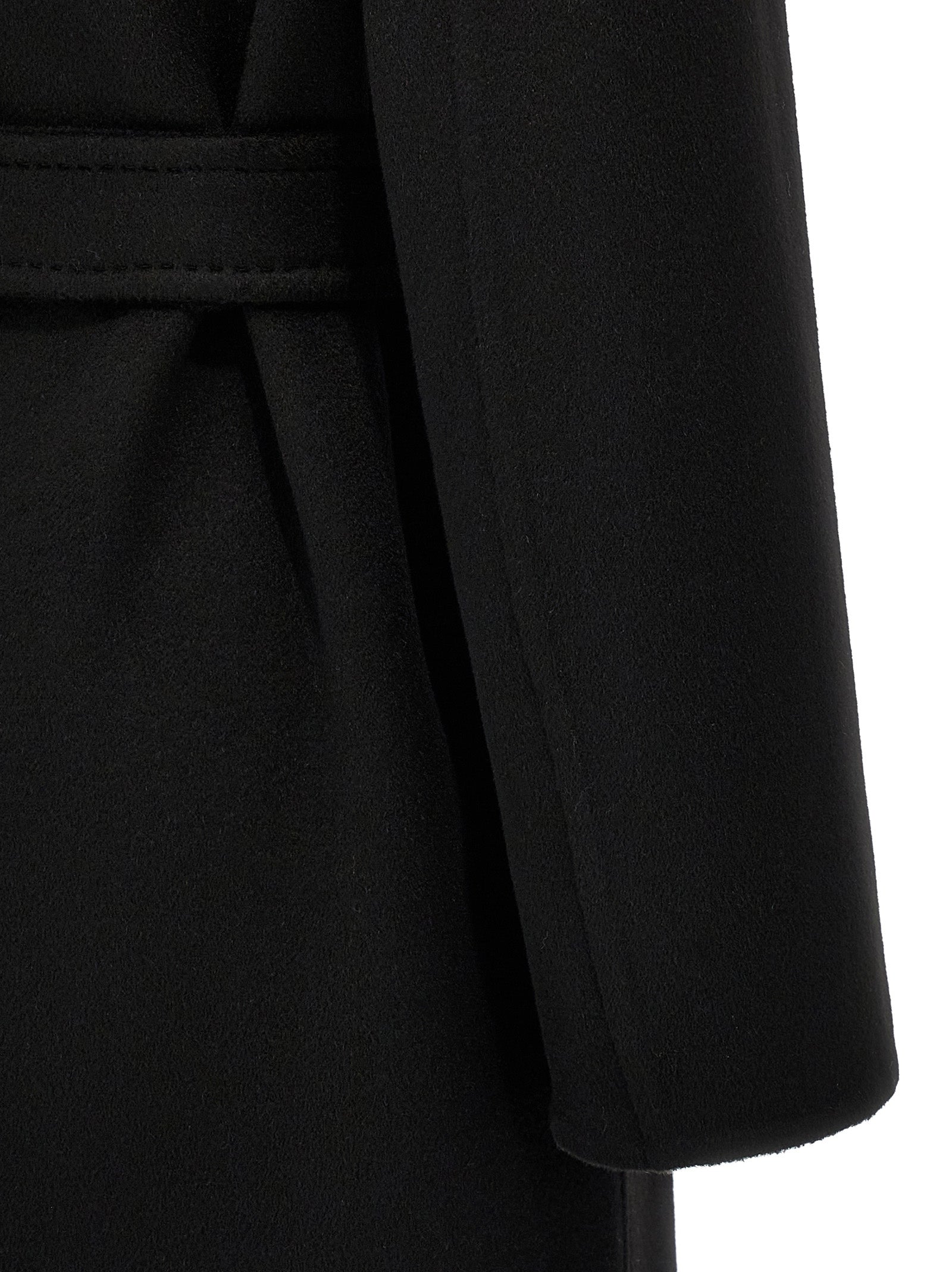 Experience the allure of the Max Mara Black Cashmere Coat, a timeless masterpiece crafted from luxurious double cashmere, perfect for elevating any sophisticated occasion.