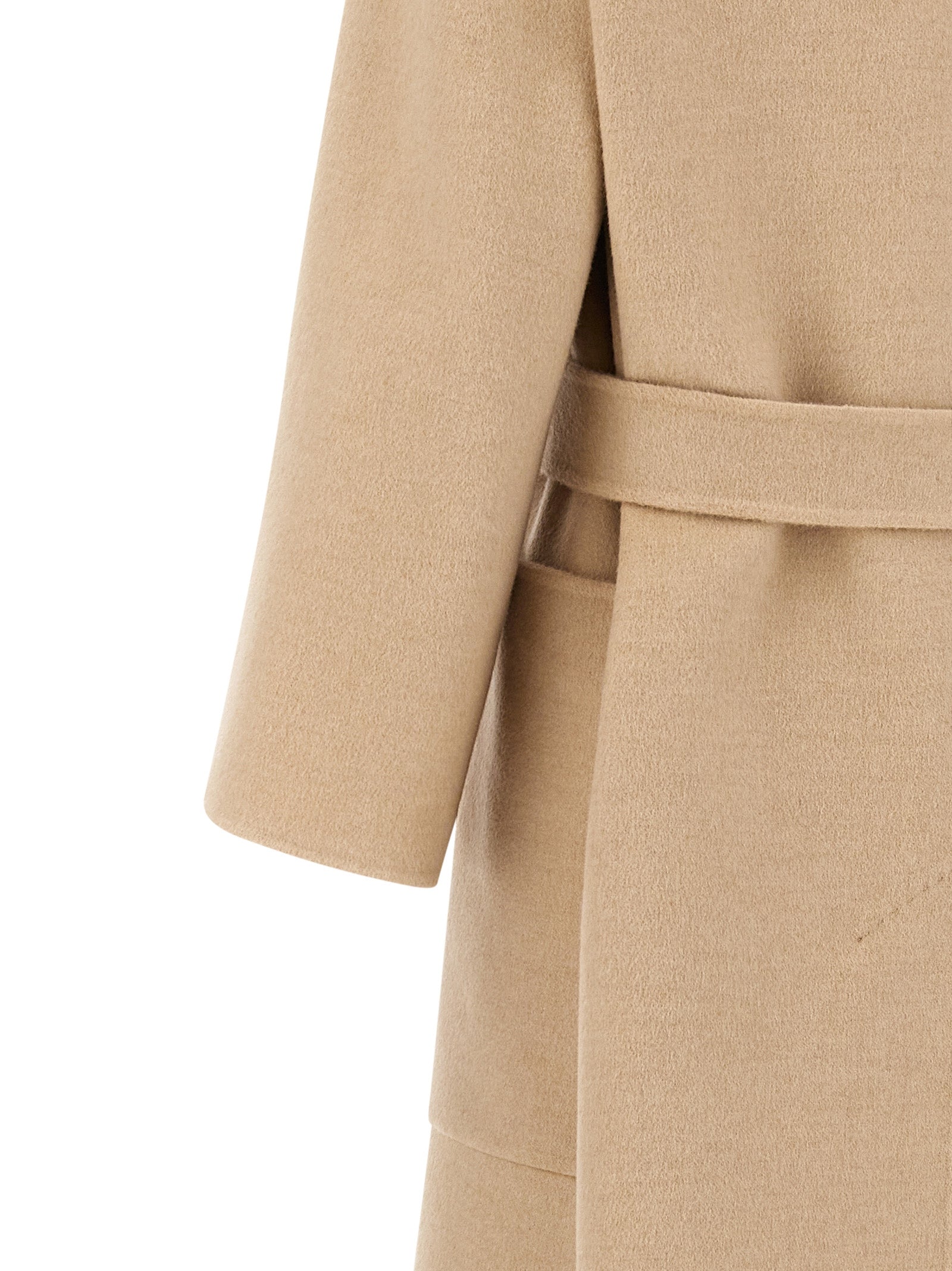 Experience the exquisite Max Mara Beige Wool Coat, crafted from pure camel wool, embodying timeless elegance and artisanal luxury for discerning individuals.